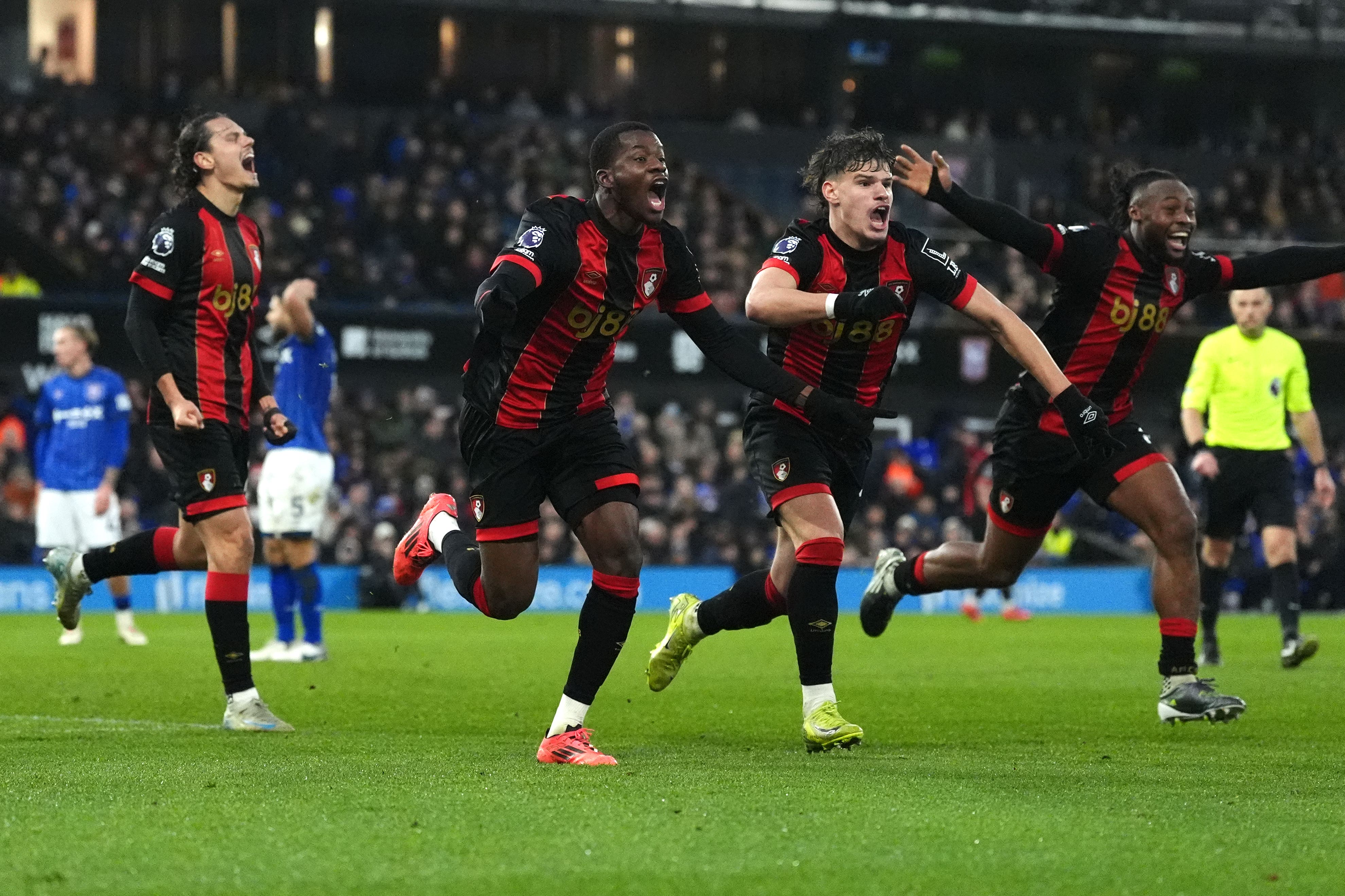 Dango Ouattara, second left, celebrates with team-mates after scoring Bournemouth’s winner deep in stoppage time (Bradley Collyer/PA)