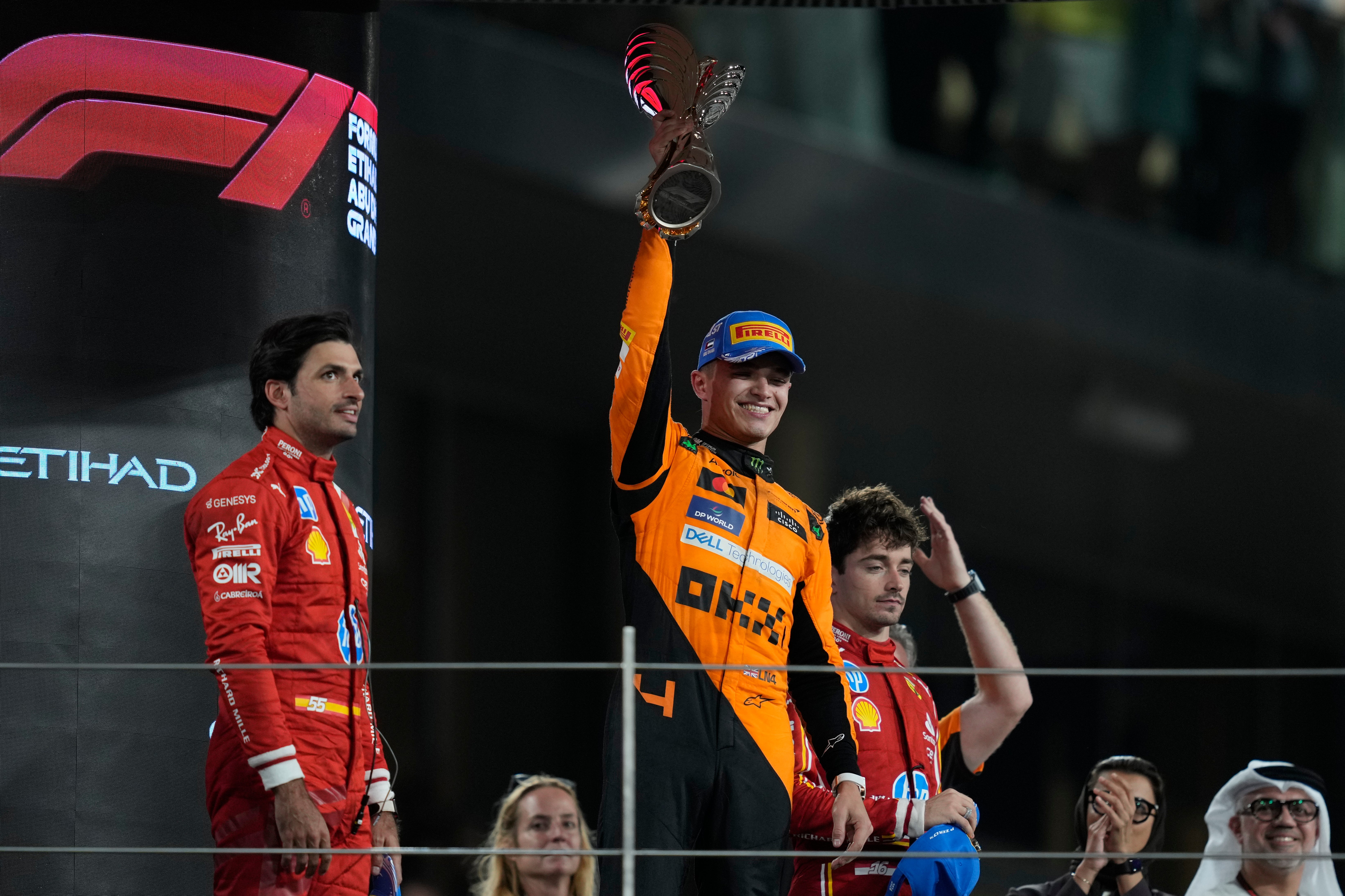 Lando Norris saw off the threat from Ferrari to win the race (Altaf Qadri/AP)