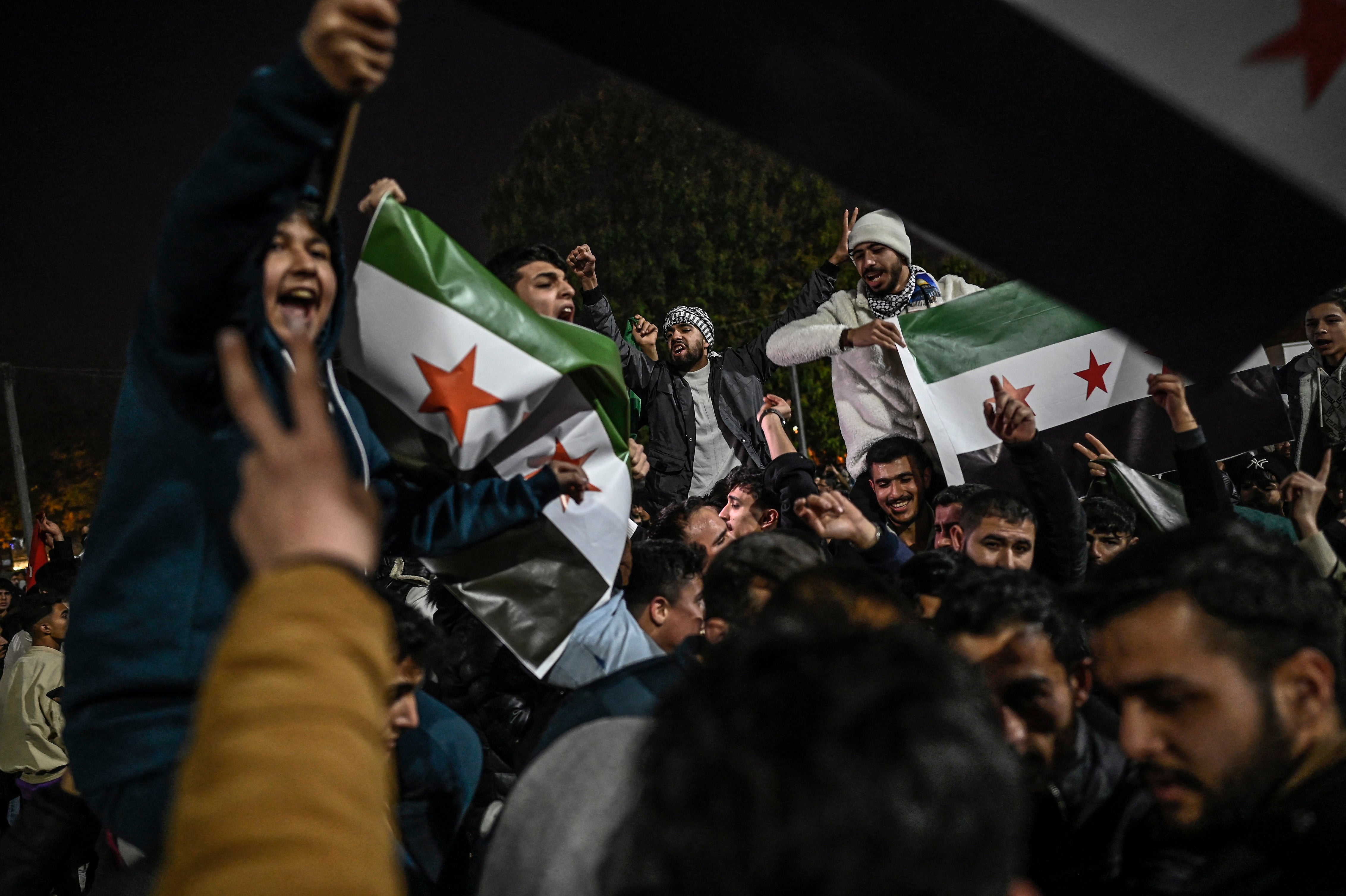 Syrian residents in Turkey celebrate the fall of Syrian president Bashar al-Assad