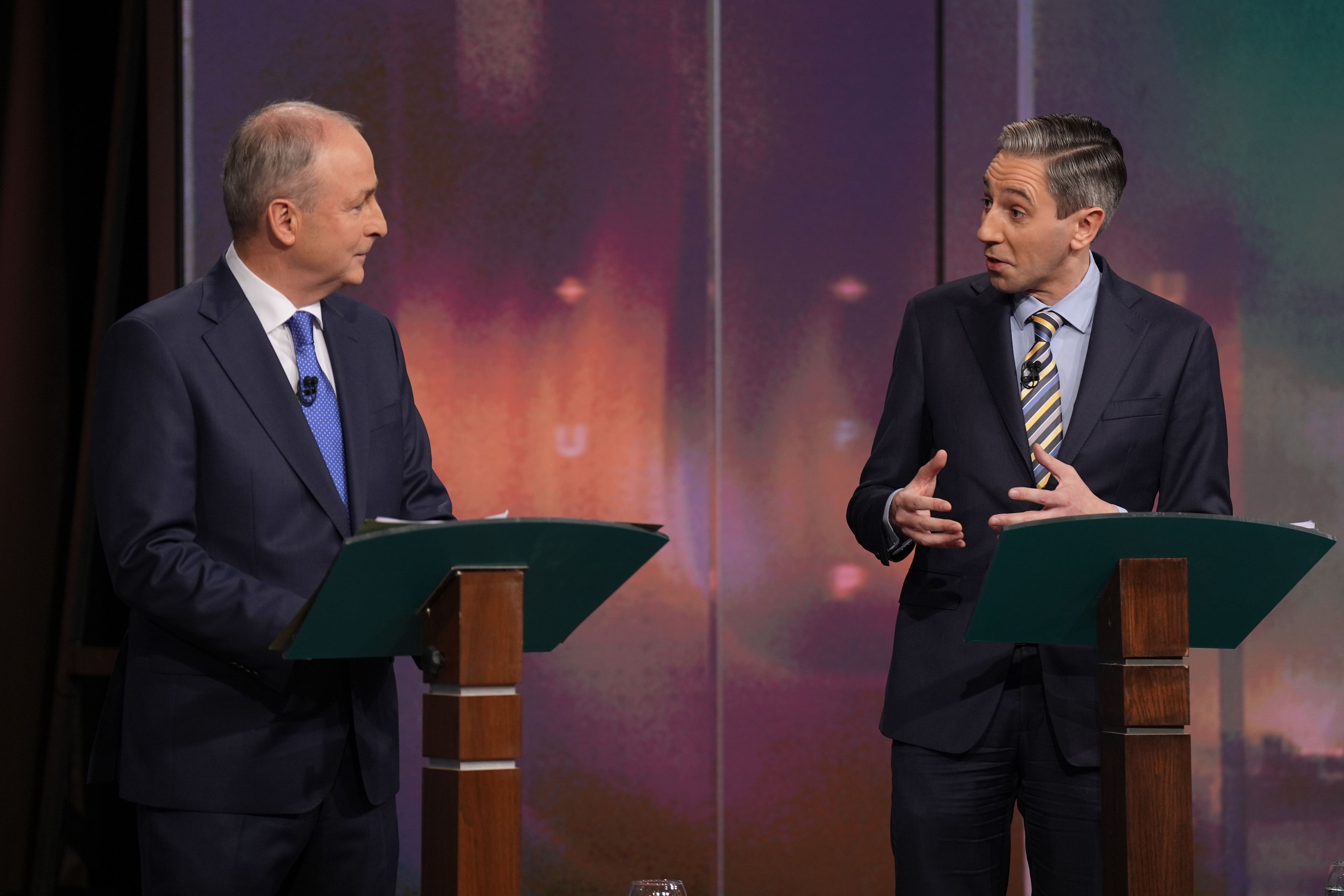 Micheal Martin and Simon Harris during the General Election leaders’ debate (Niall Carson/PA)