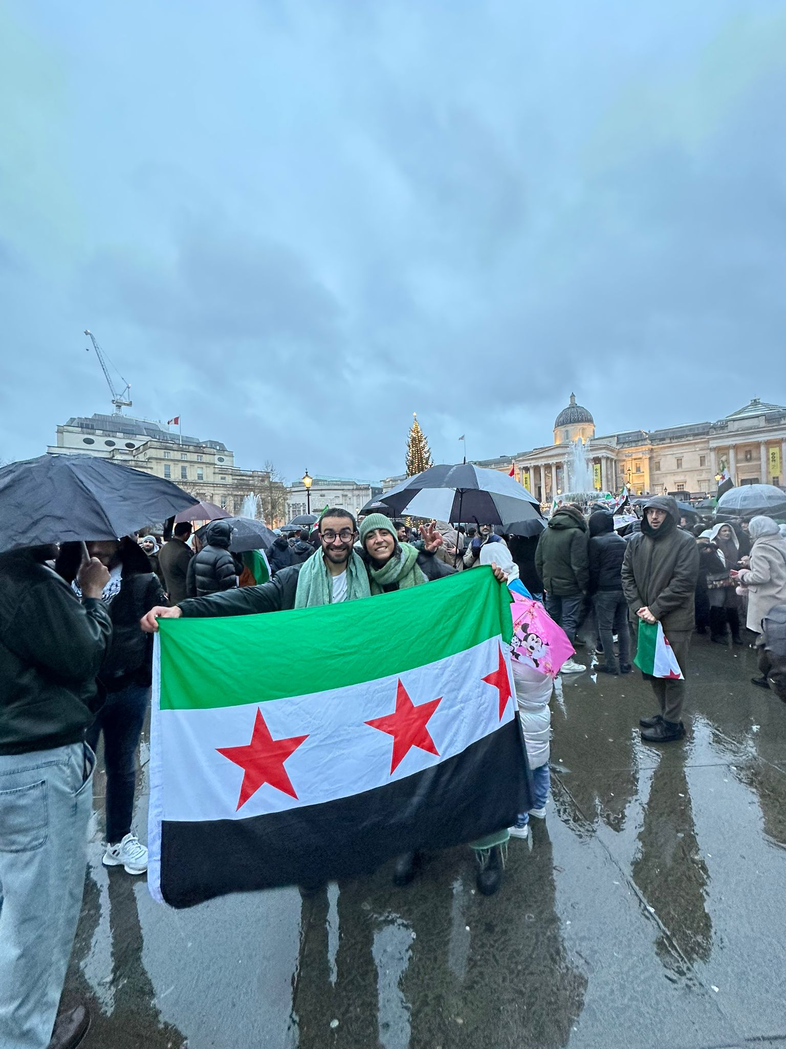 Hundreds of Syrians gathered in Trafalgar Square to celebrate Assad’s regime collapse