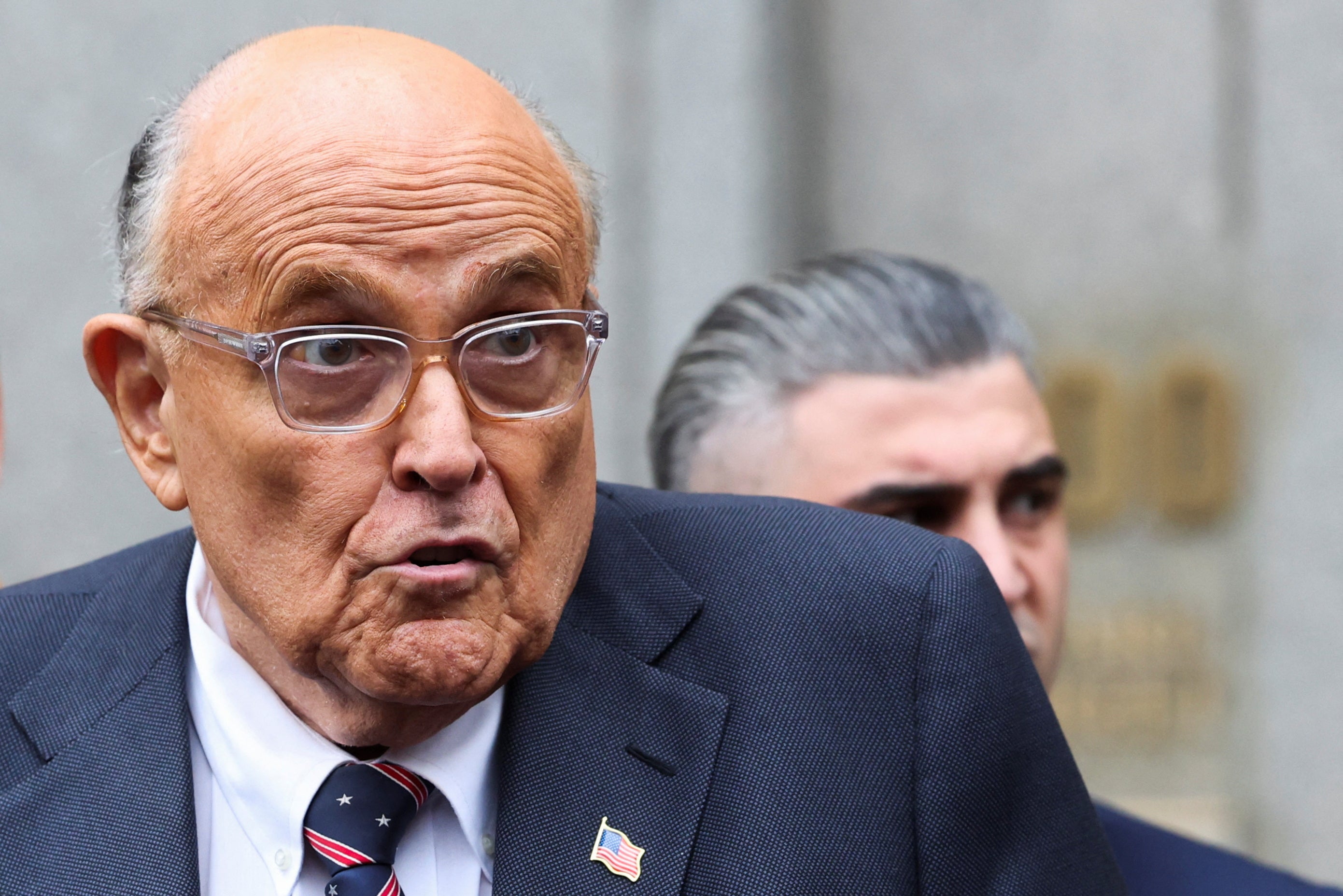 A federal judge warned Rudy Giuliani that he could face ‘imprisonment’ if held in contempt for his statements about election workers he defamed