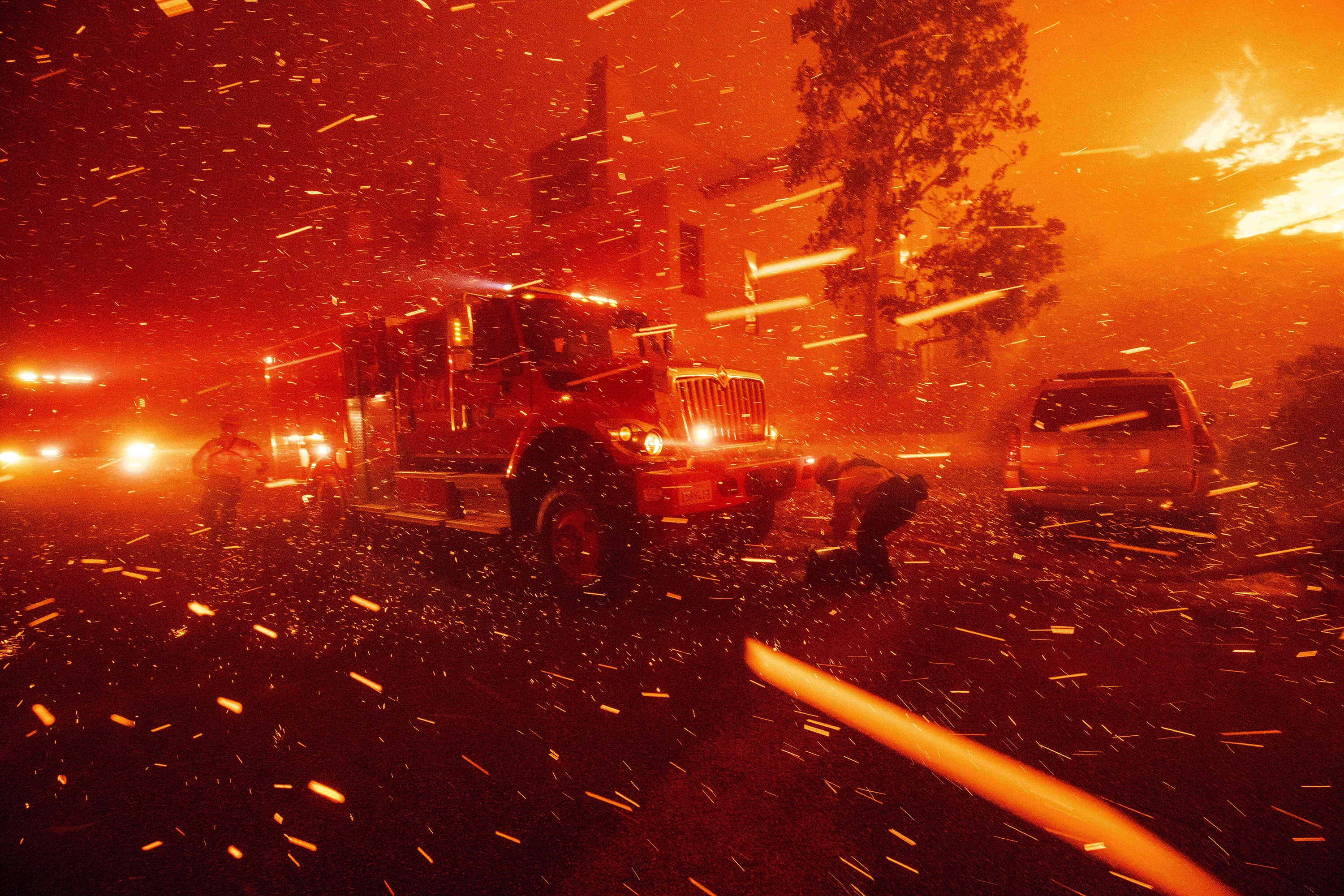 Firefighters battle the Franklin Fire on Tuesday in Malibu, California. The blaze, fueled by extremely critical fire weather, has stretched over 2,200 acres