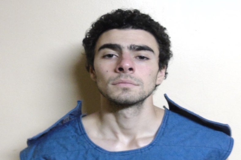 A booking photo released by the Pennsylvania Department of Corrections show Mangione a week after the killing