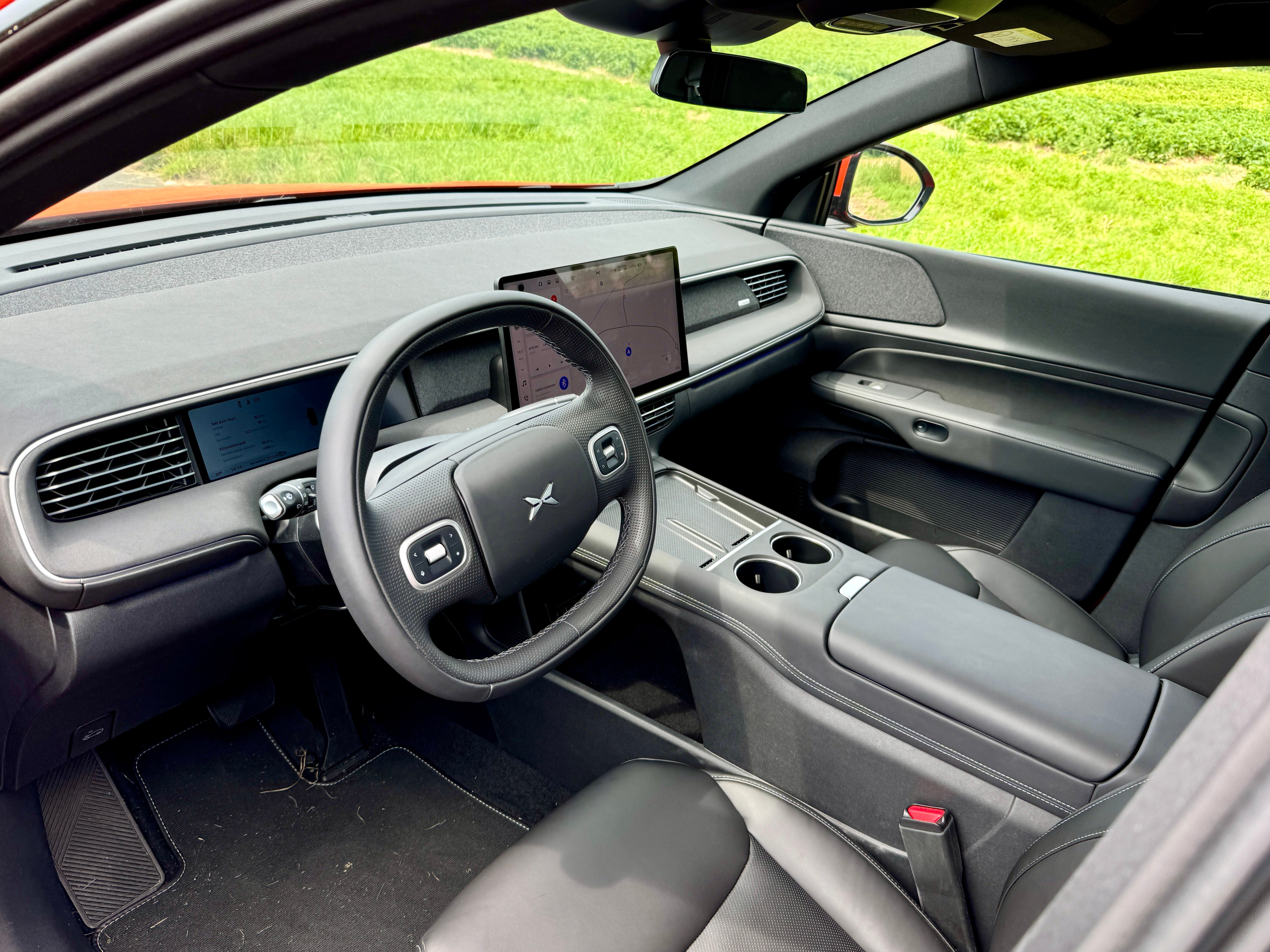 The Xpeng G6 interior is well made and features 15-inch infotainment and 10-inch driver display screens