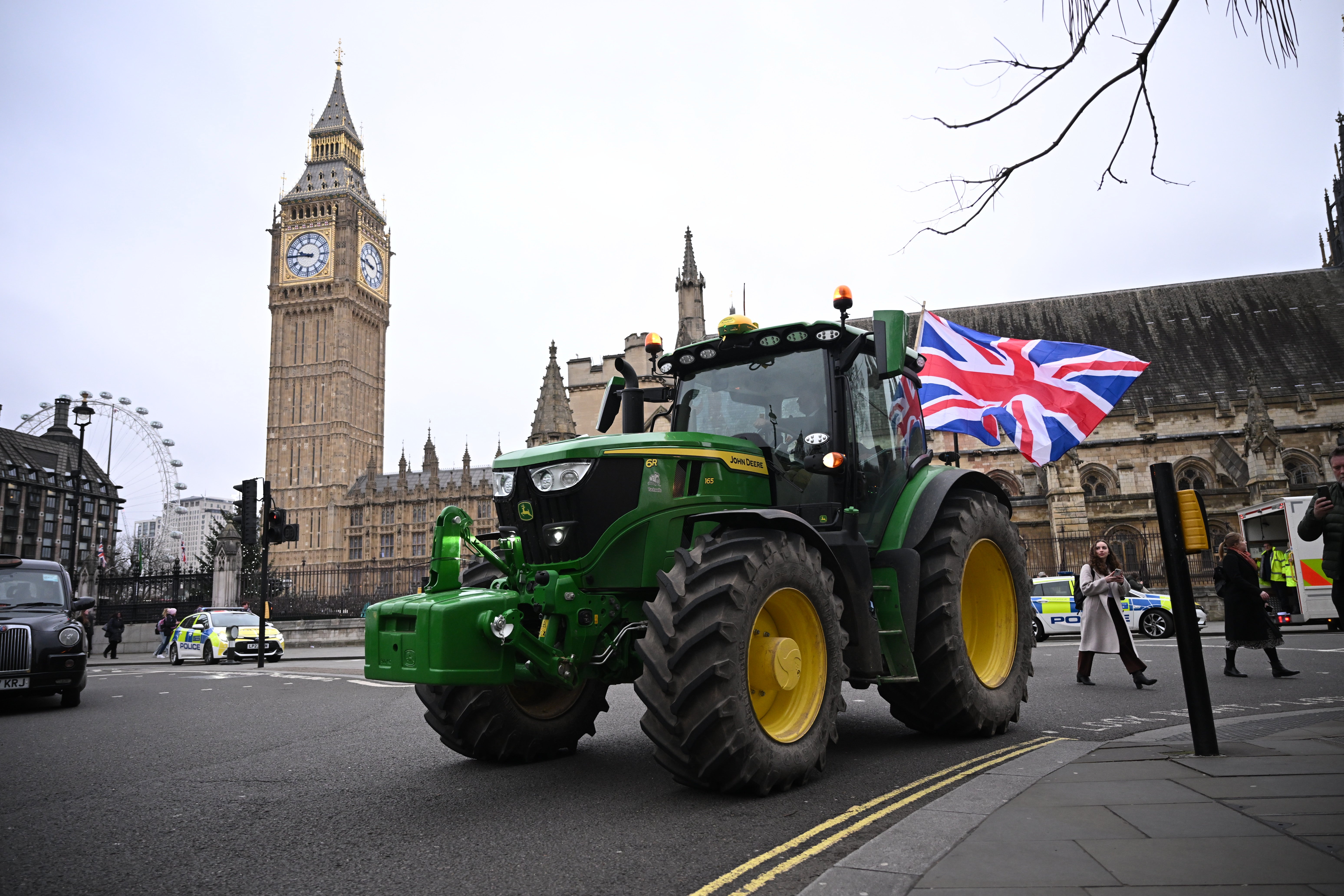 A tractor drives in London during a "RIP British Farming" protest, December 11 2024