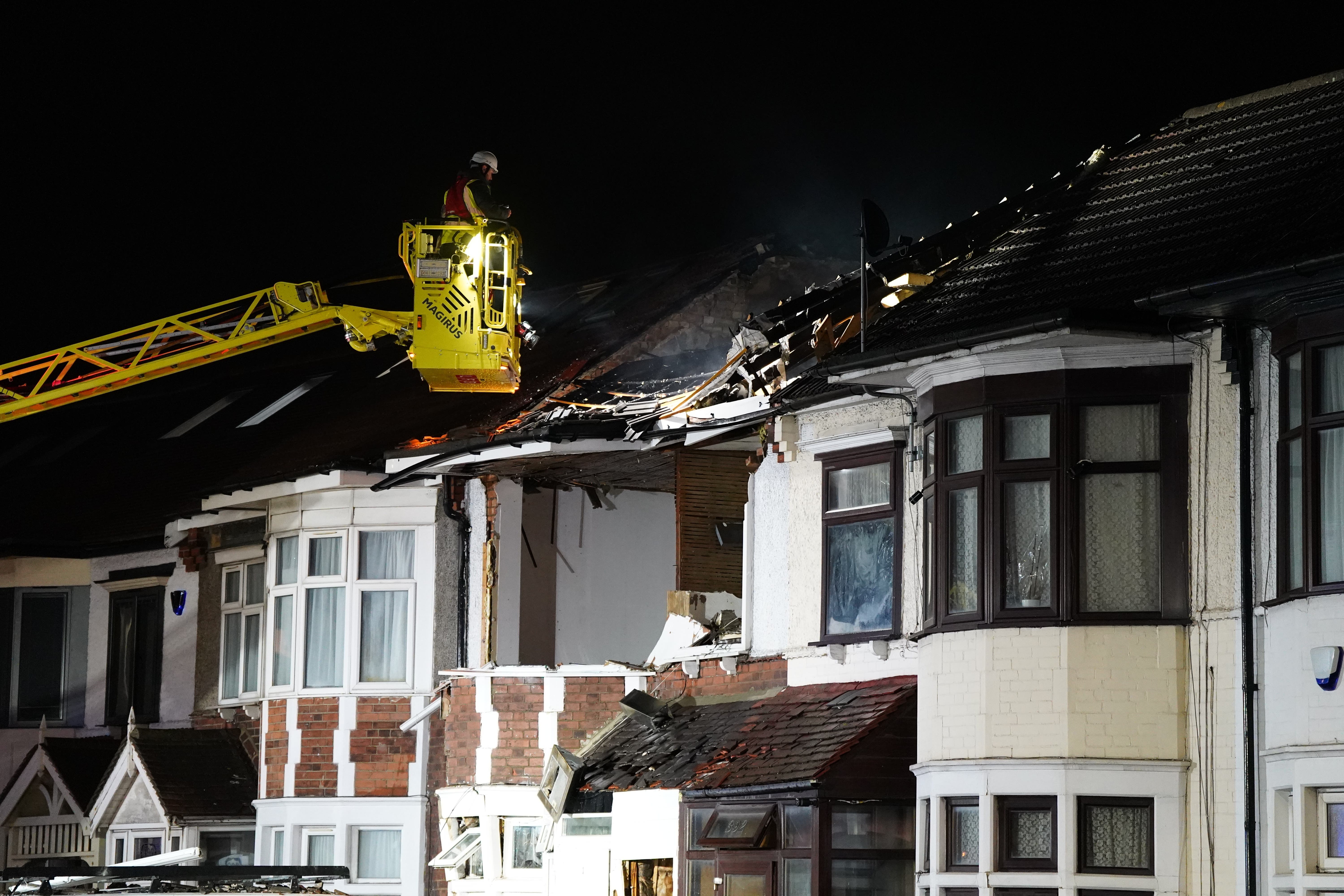 Firefighters attend the scene on Ley Street, Ilford, after two people were taken to hospital (Ben Whitley/PA)