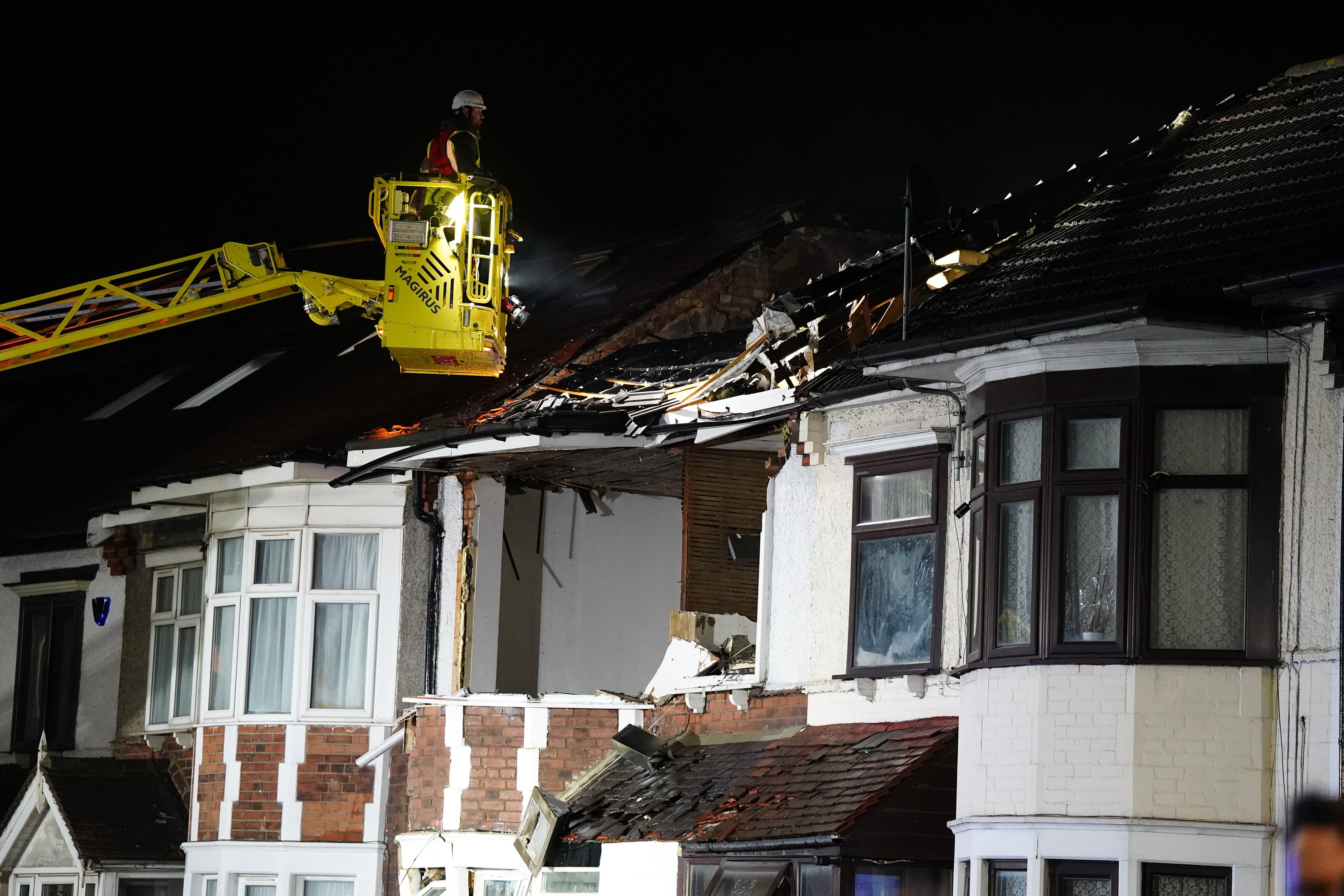 Firefighters at the scene on Ley Street, Ilford, after two people were taken to hospital as 60 firefighters tackled a blaze following an explosion in east London (Ben Whitley/PA)