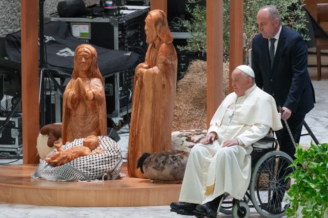 <p>Pope Francis arrives to meet the donors of the fir tree set up in St. Peter’s Square</p>