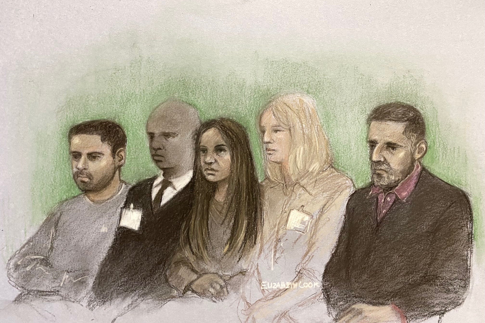 Sarah Sharif’s father Urfan Sharif (right) her uncle Faisal Malik (left), and stepmother Beinash Batool (centre), sitting alongside dock officers at the Old Bailey in London during their trial (Elizabeth Cook/PA)