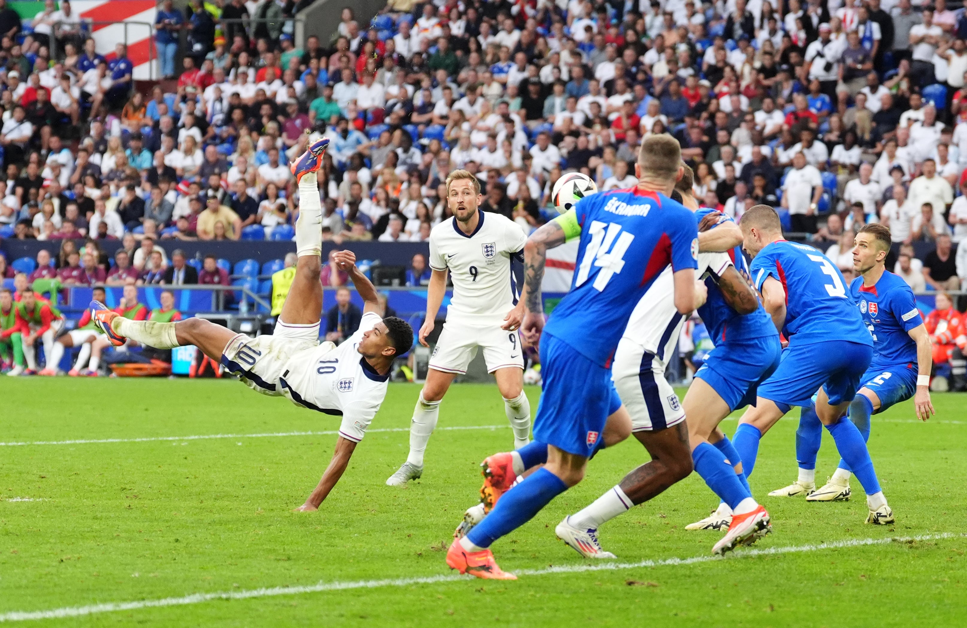 Jude Bellingham scored an overhead kick in stoppage time to help England to a 2-1 win over Slovakia in their last-16 meeting at Euro 2024