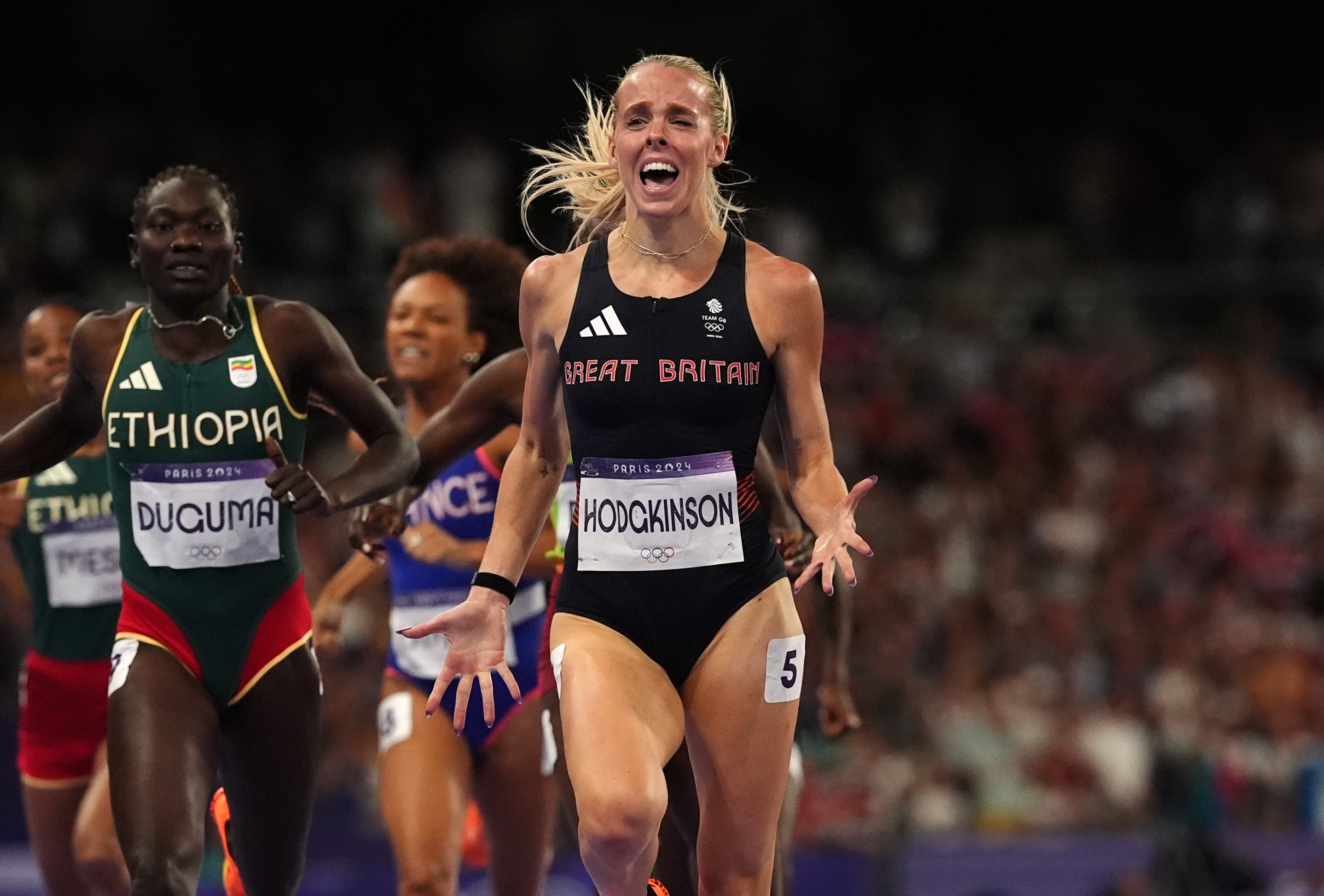Keely Hodgkinson celebrates her Olympic 800m win