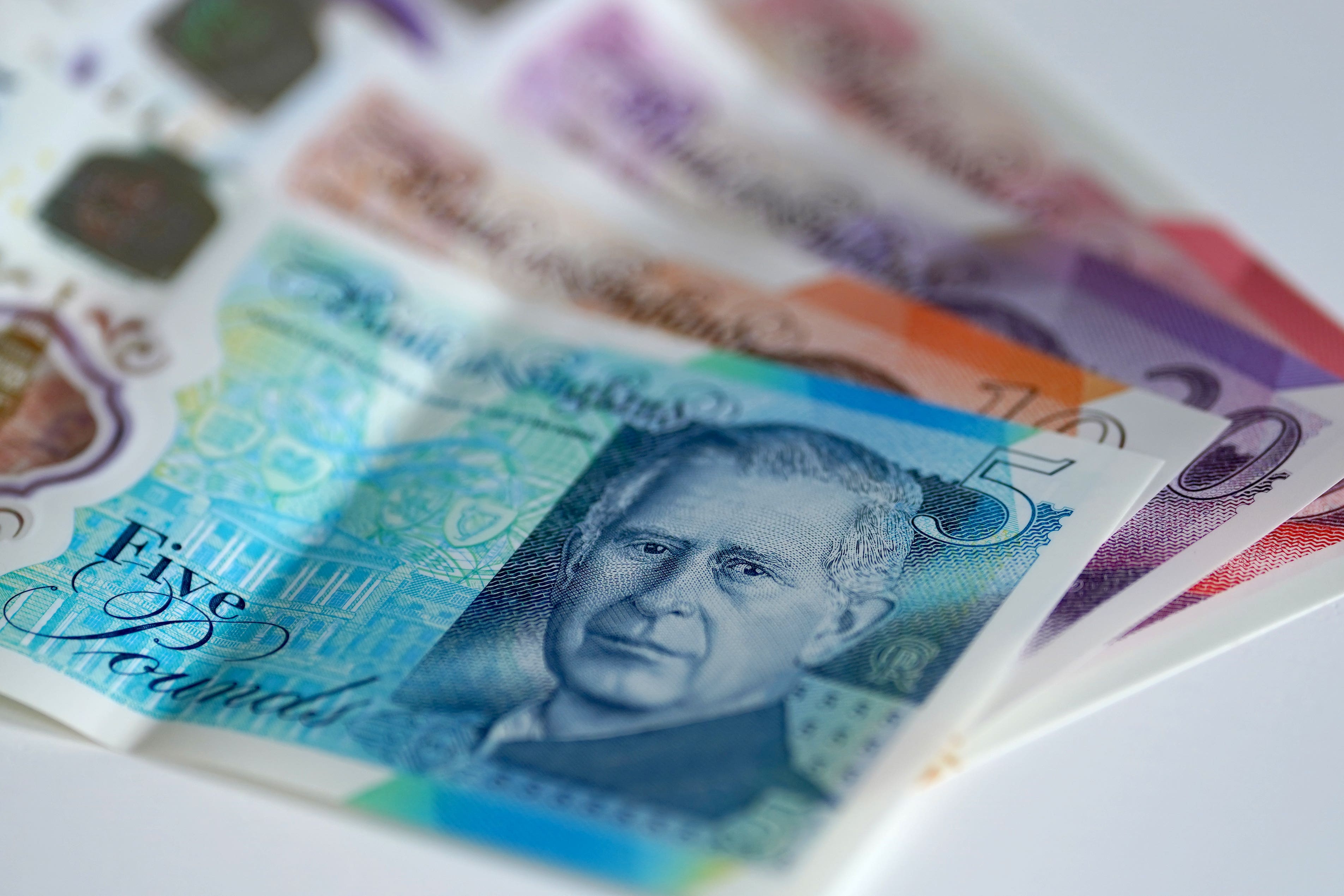 De La Rue has seen half-year earnings slide (PA)