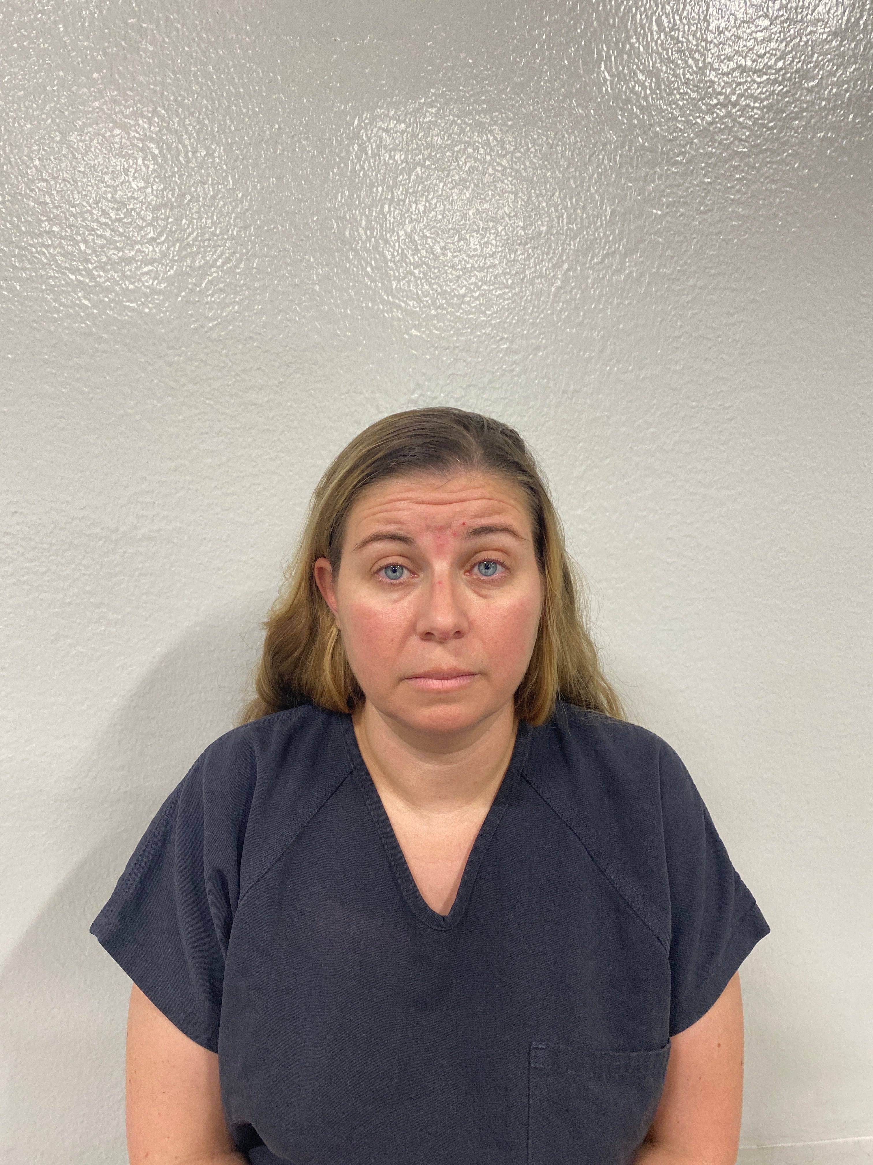 Briana Boston was arrested after allegedly citing the words to a health insurance employee that were found written on bullet casings at the scene of the fatal shooting of UnitedHealthcare CEO Brian Thompson.