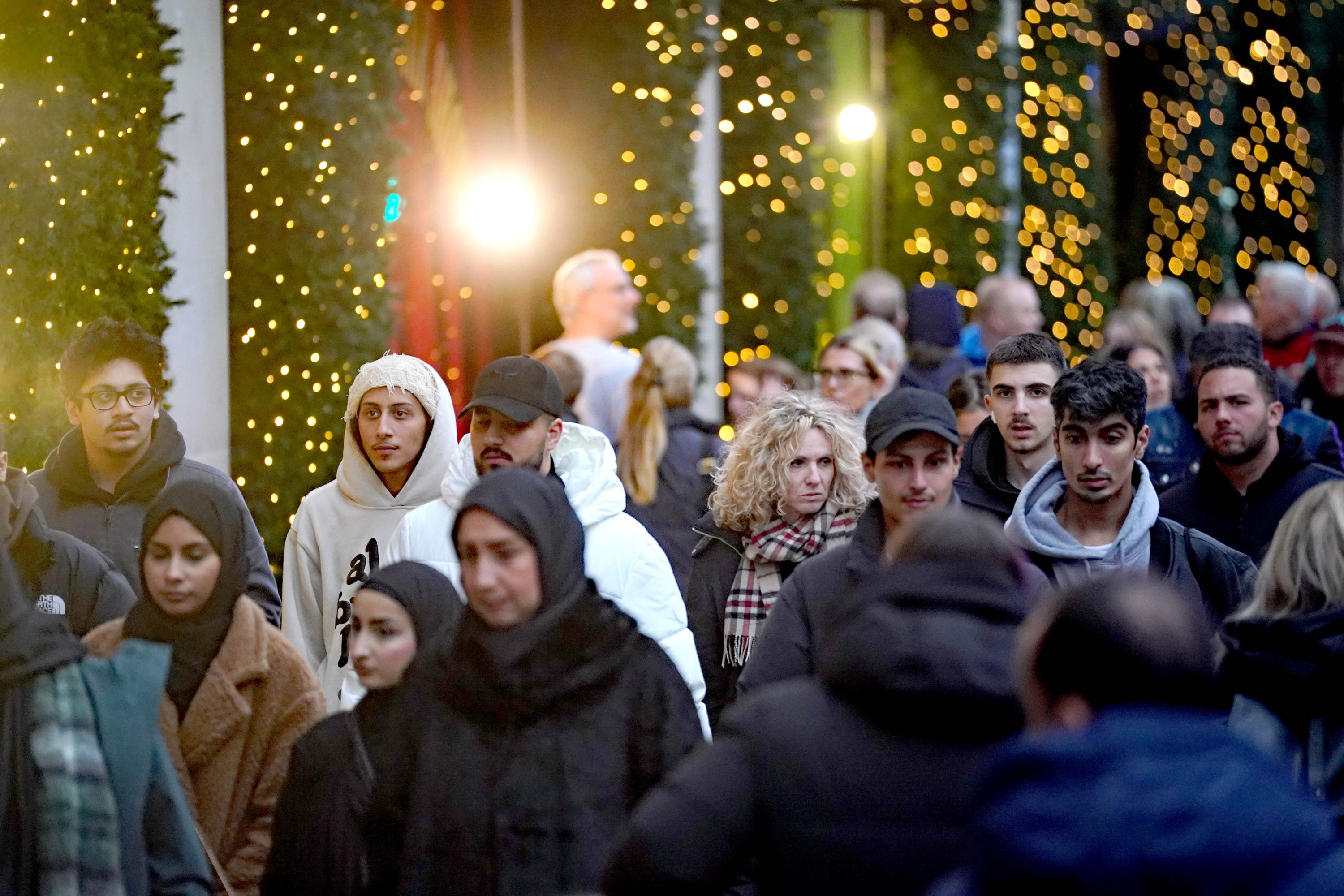 Consumer confidence remained suppressed in December amid the ‘continuing uncharitable view on the UK’s general economic situation’, a survey suggests (PA)