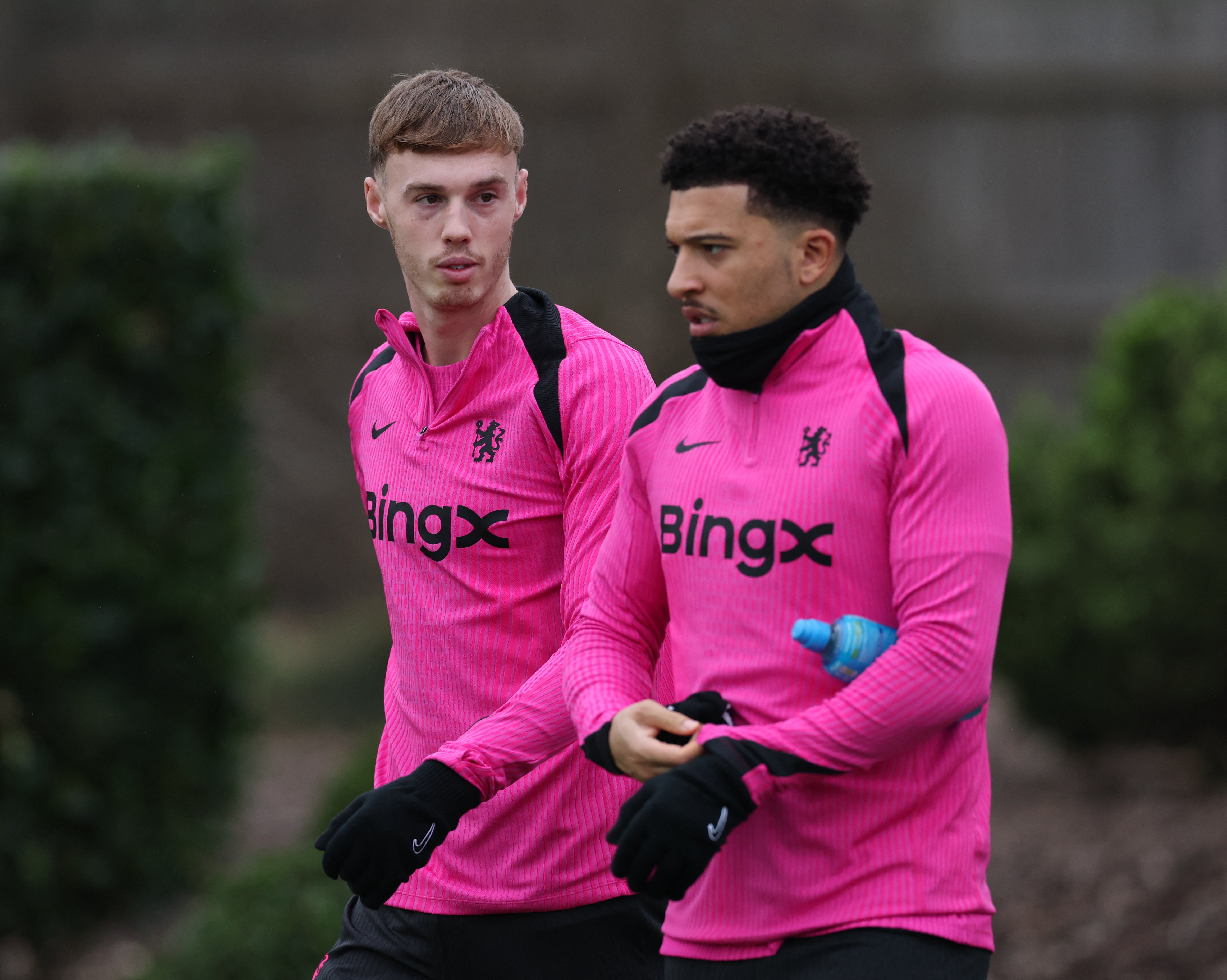 Chelsea’s Cole Palmer with Jadon Sancho during training in Cobham