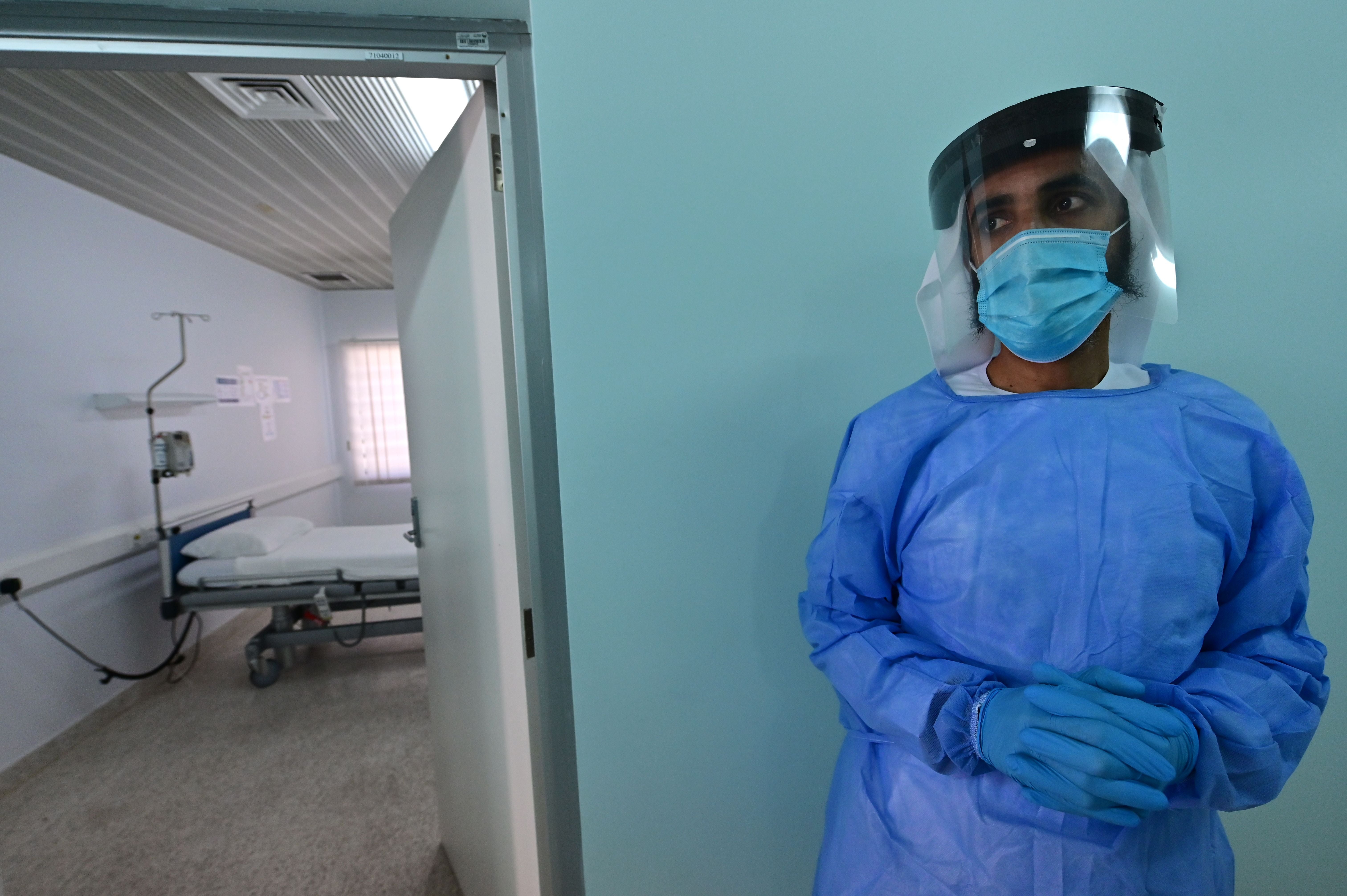 A doctor shows a room at the medical centre of Dubai's Al-Awir central prison