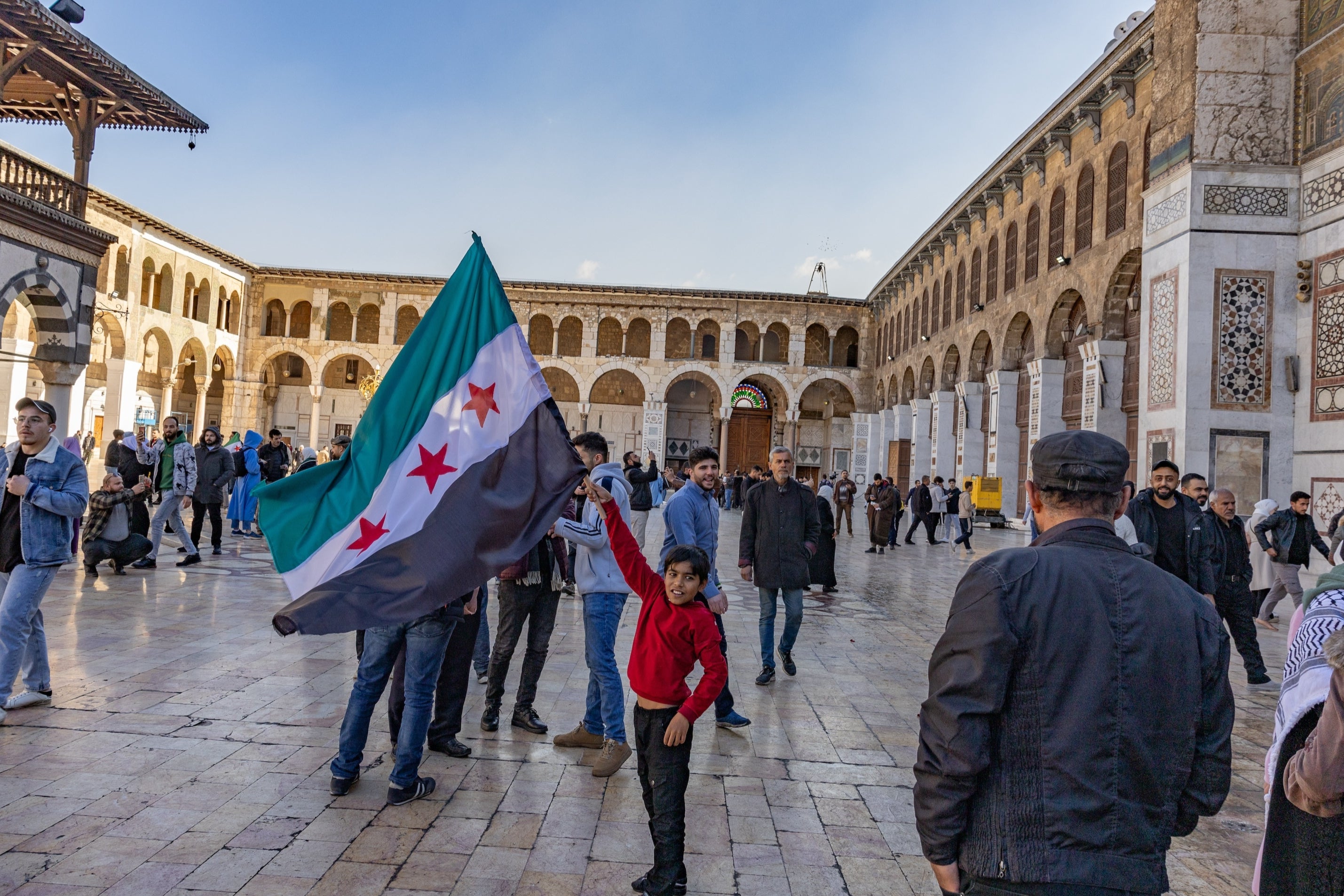 Syrians gather at the Ummayyad Mosque in Damascus