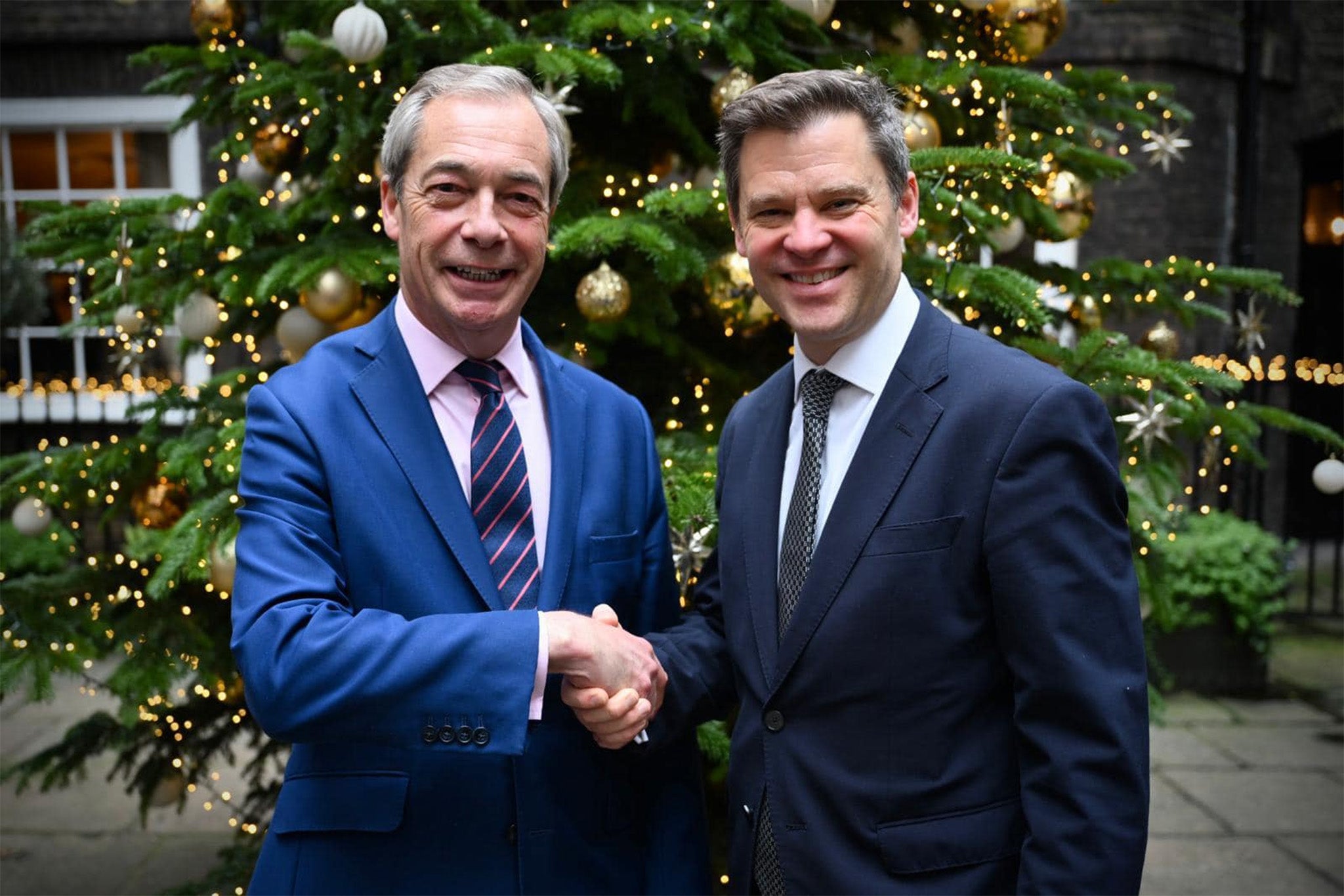 Floorplay: Nigel Farage and fellow traveller Aidan Burley mark their union in understated fashion