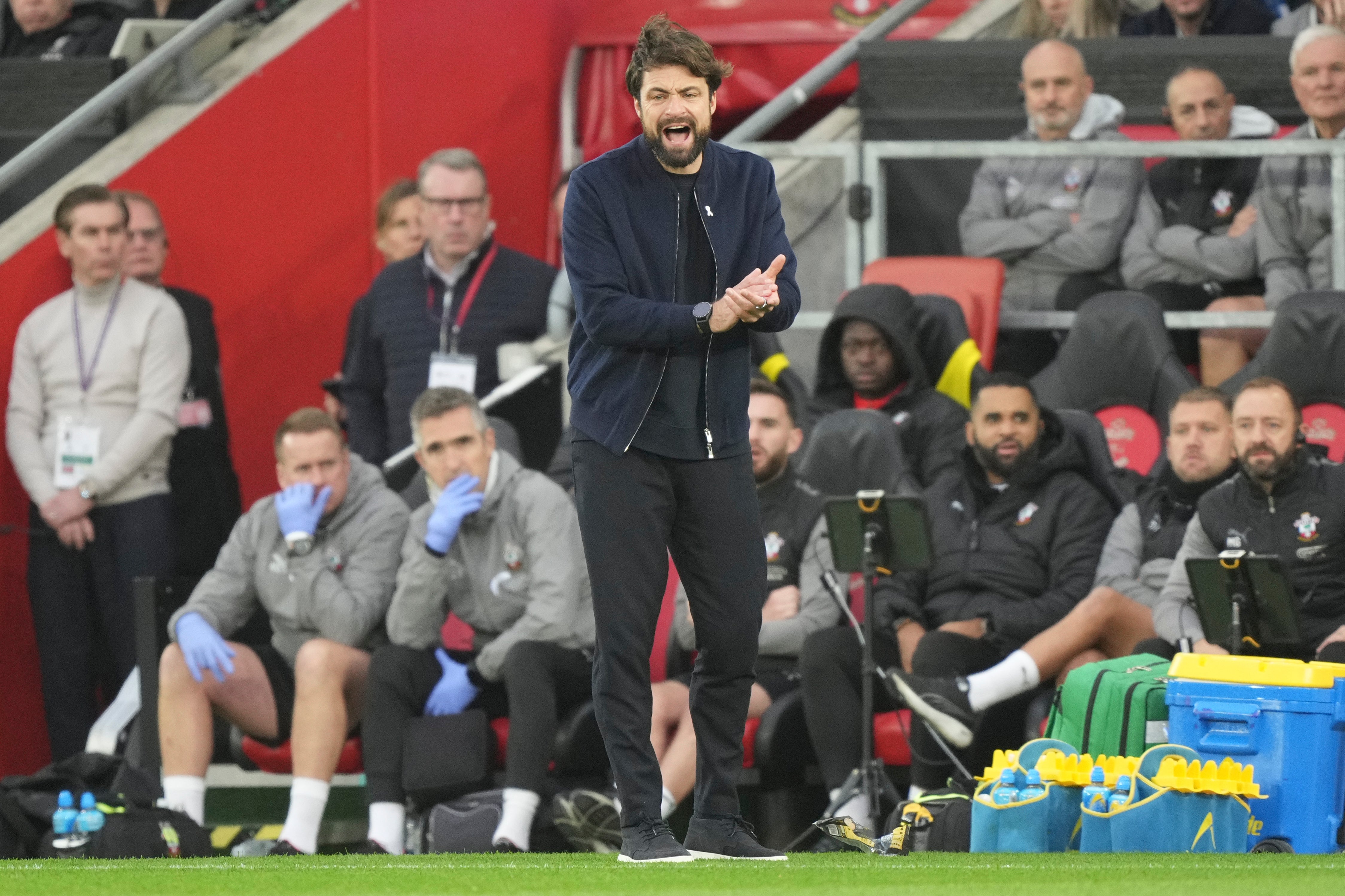 Russell Martin shouts orders from the touchline against Liverpool