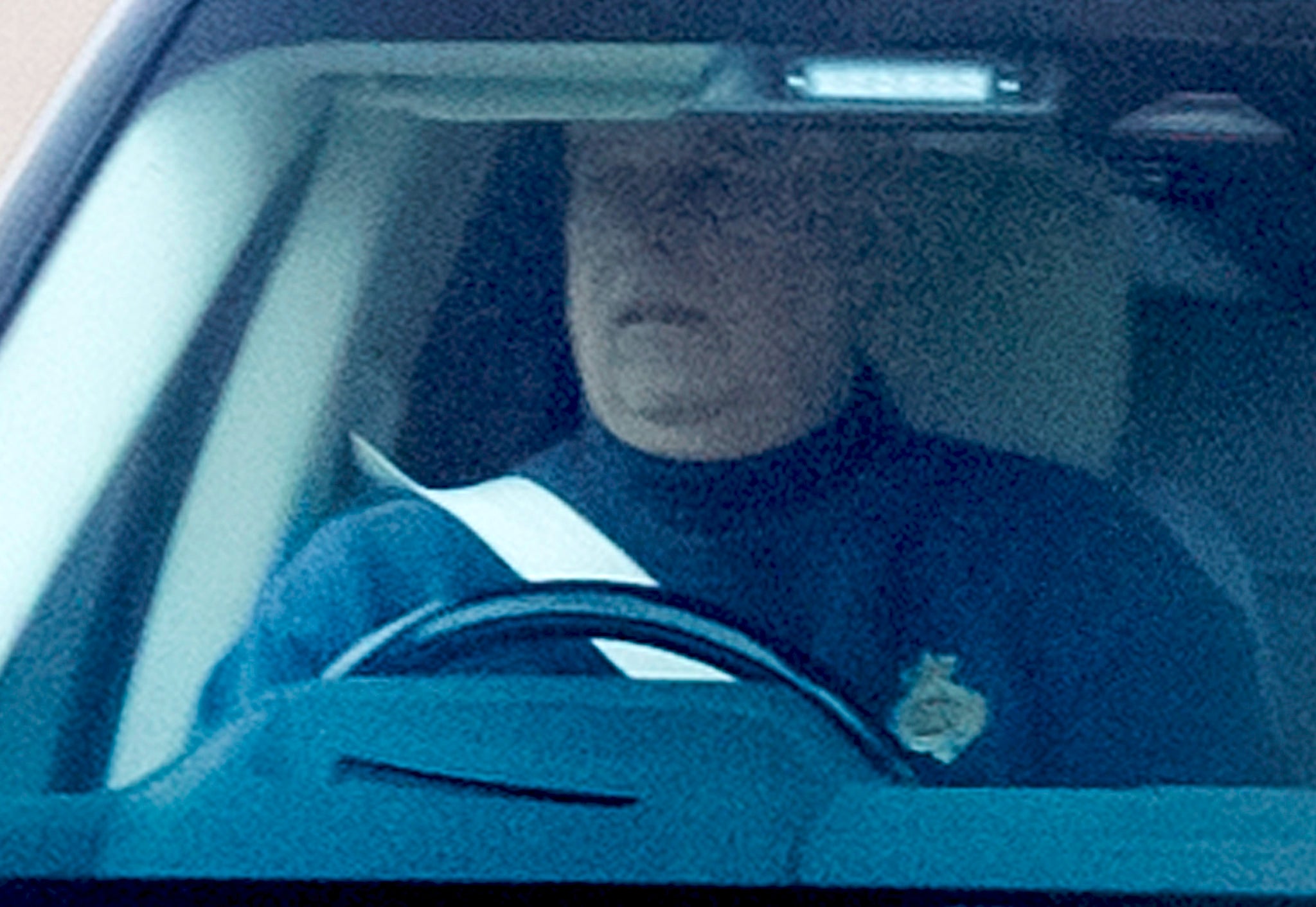 Prince Andrew has been pictured driving from Royal Lodge in Windsor amid spy scandal allegations