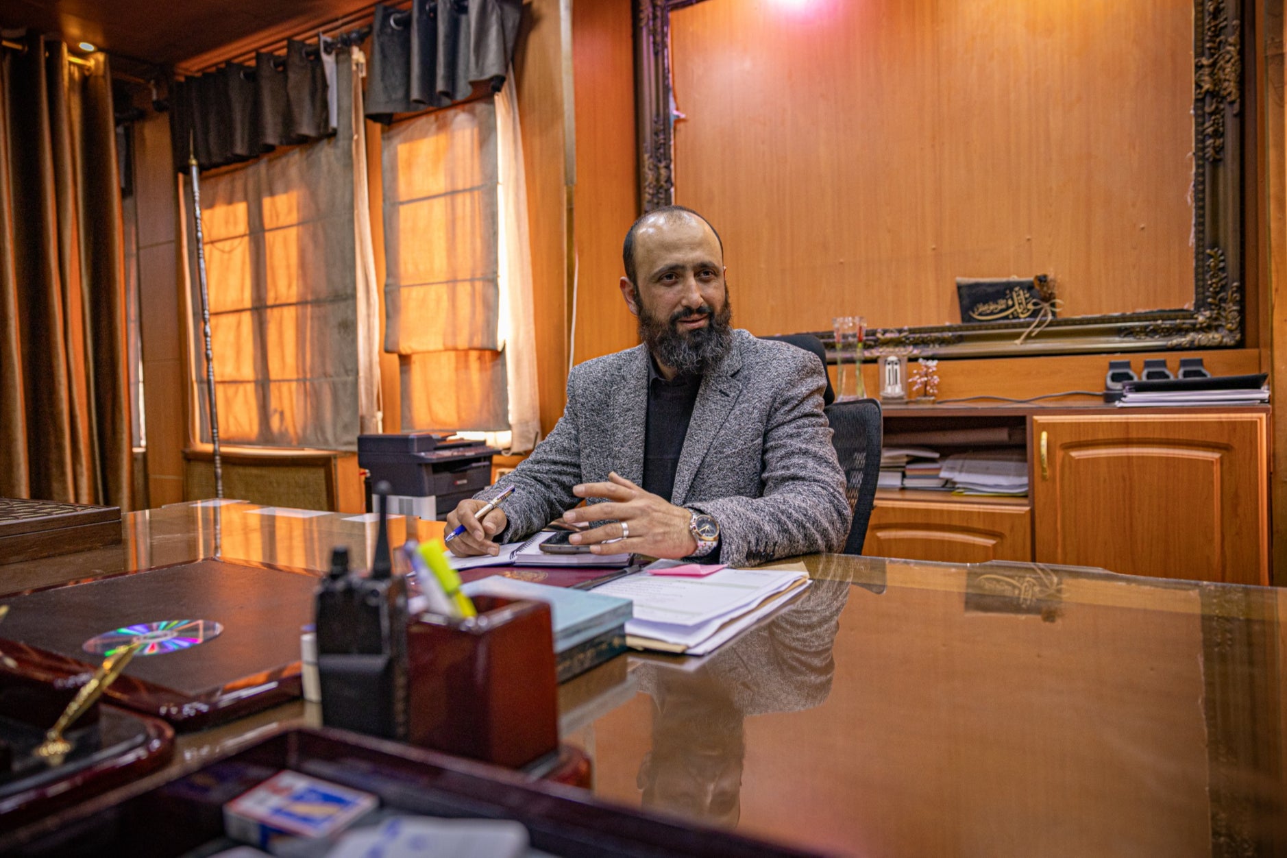 Alaa Omran in his office as police chief of the city of Homs