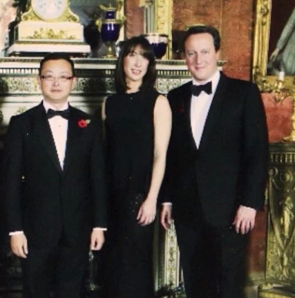 Yang Tengbo pictured with former prime minister David Cameron and wife Samantha