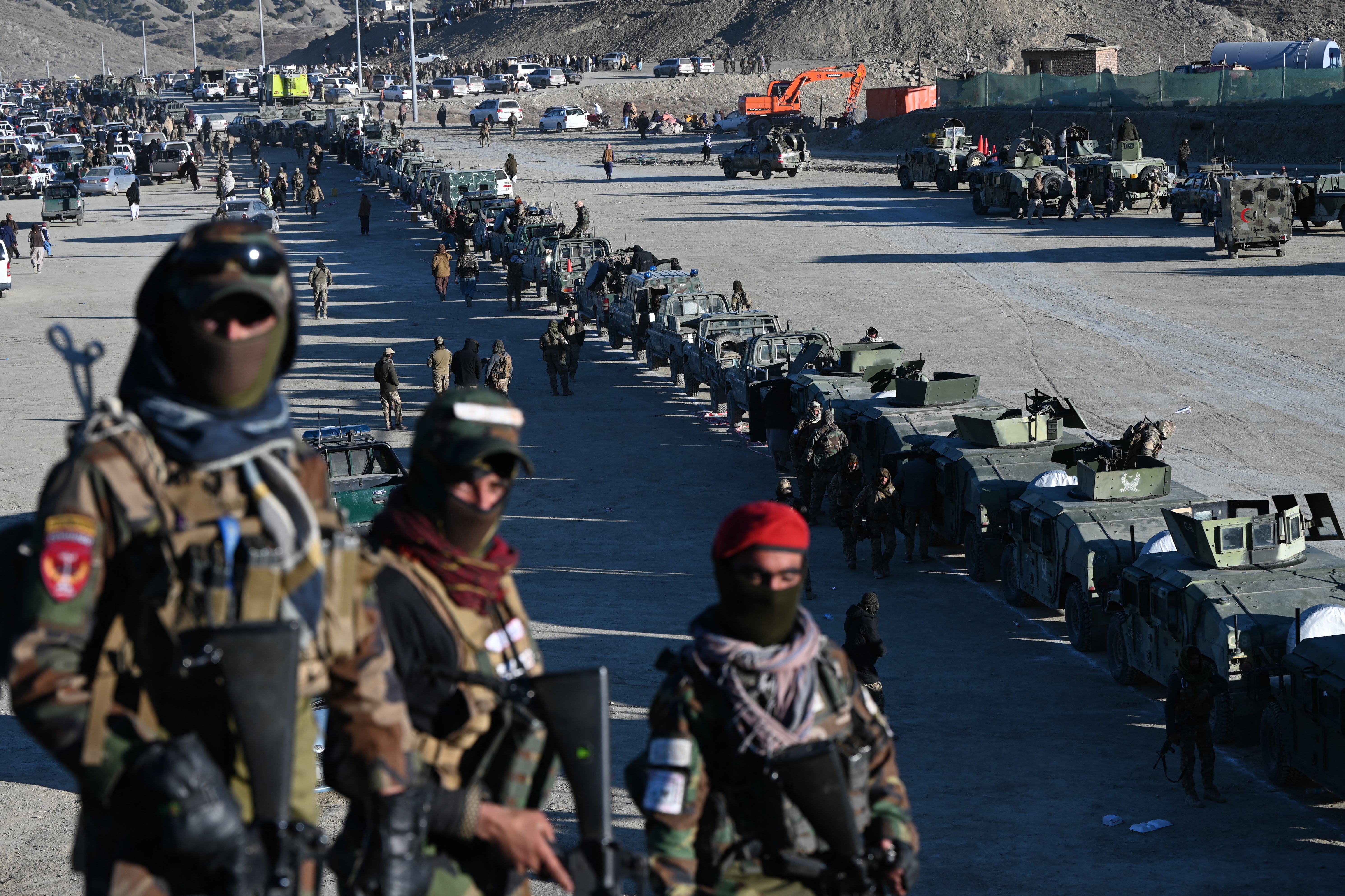 Humvees are seen parked during the funeral ceremony of Khalil Haqqani