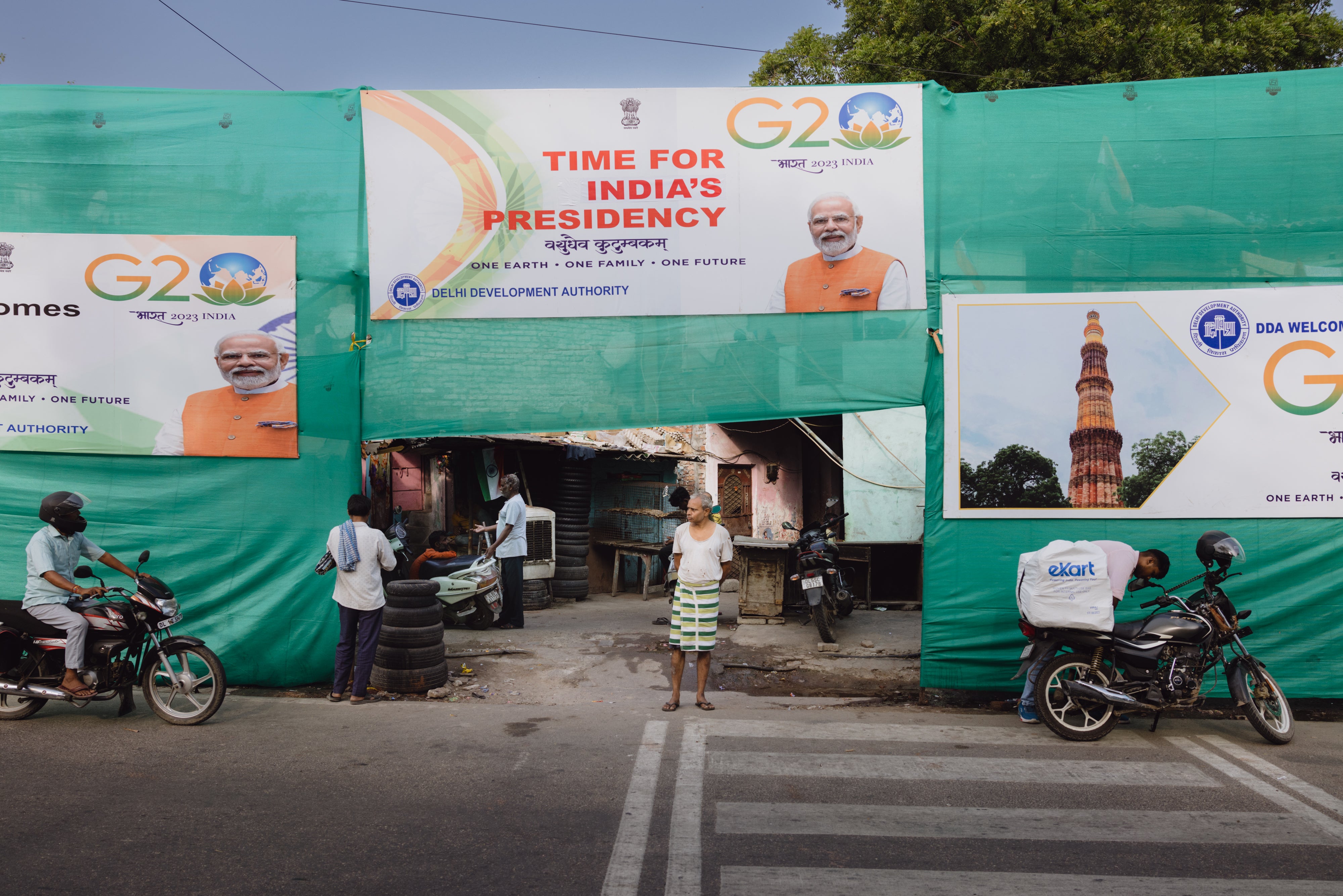 A slum area is covered up as part of a beautification project ahead of G20