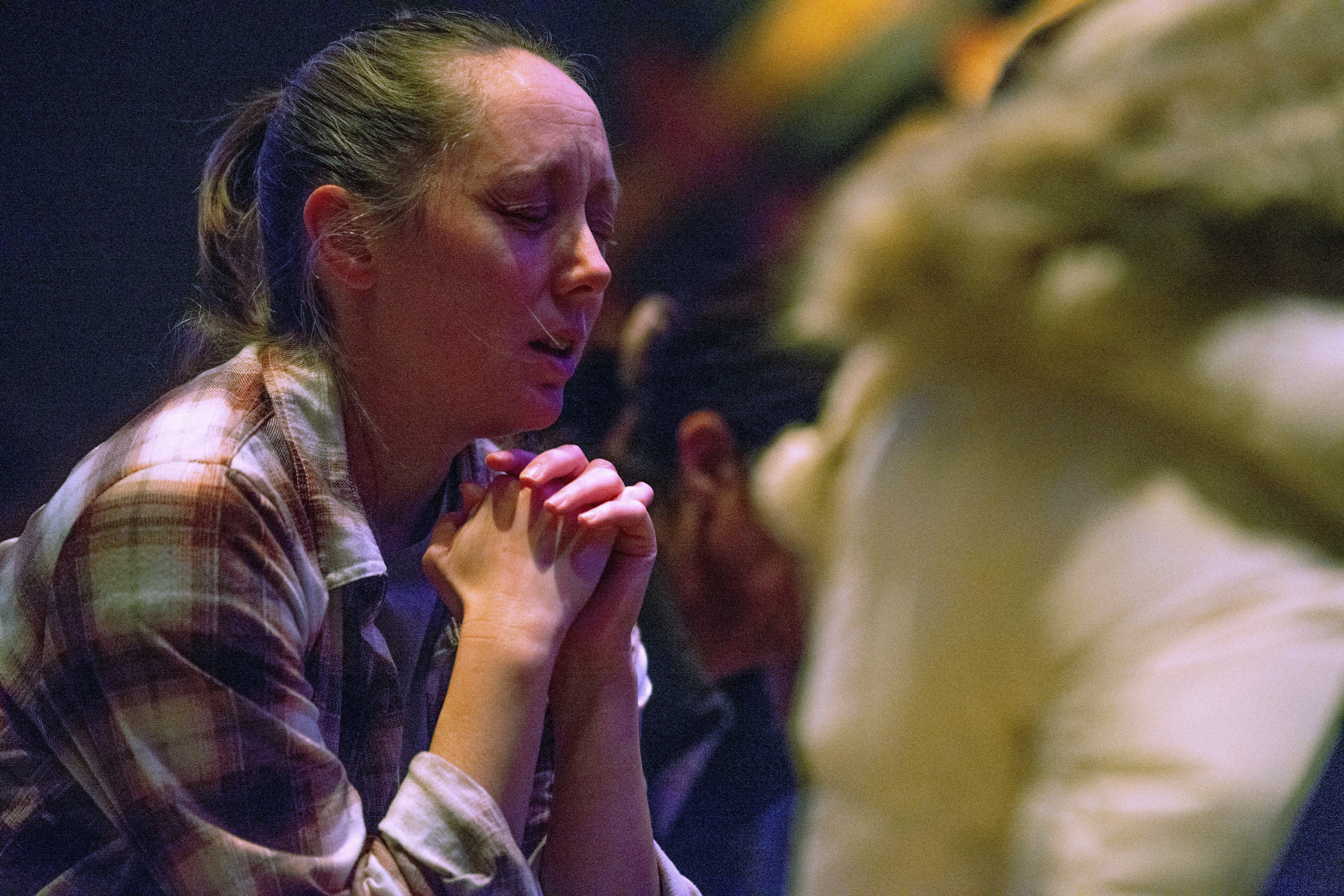 Worshipers at Blackhawk Church gather to pray for victims and survivors of a shooting at Madison's Abundant Life Christian School