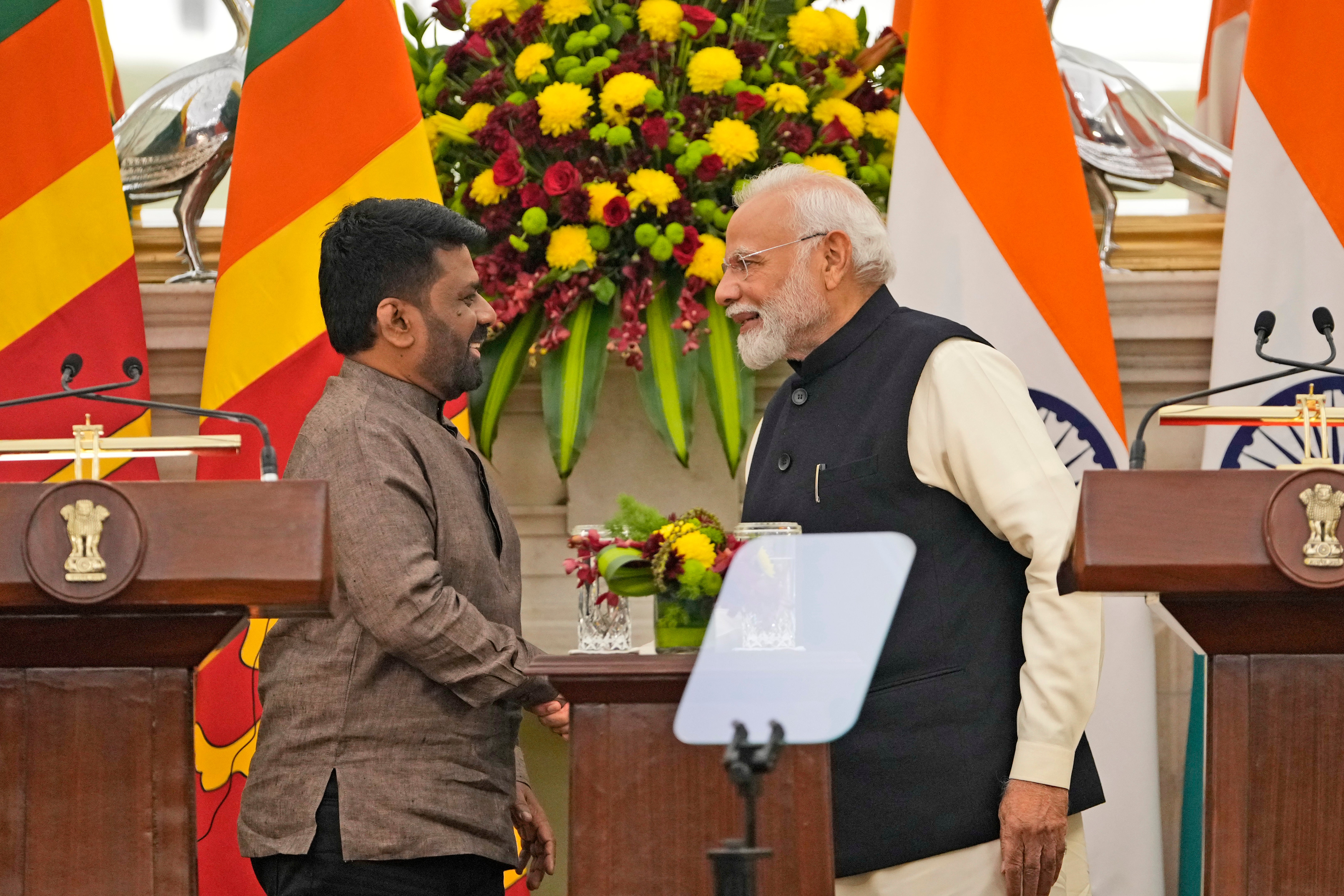 Indian prime minister Narendra Modi, right, shakes hand with Sri Lankan president Anura Kumara Disanayaka after a joint press statement in New Delhi