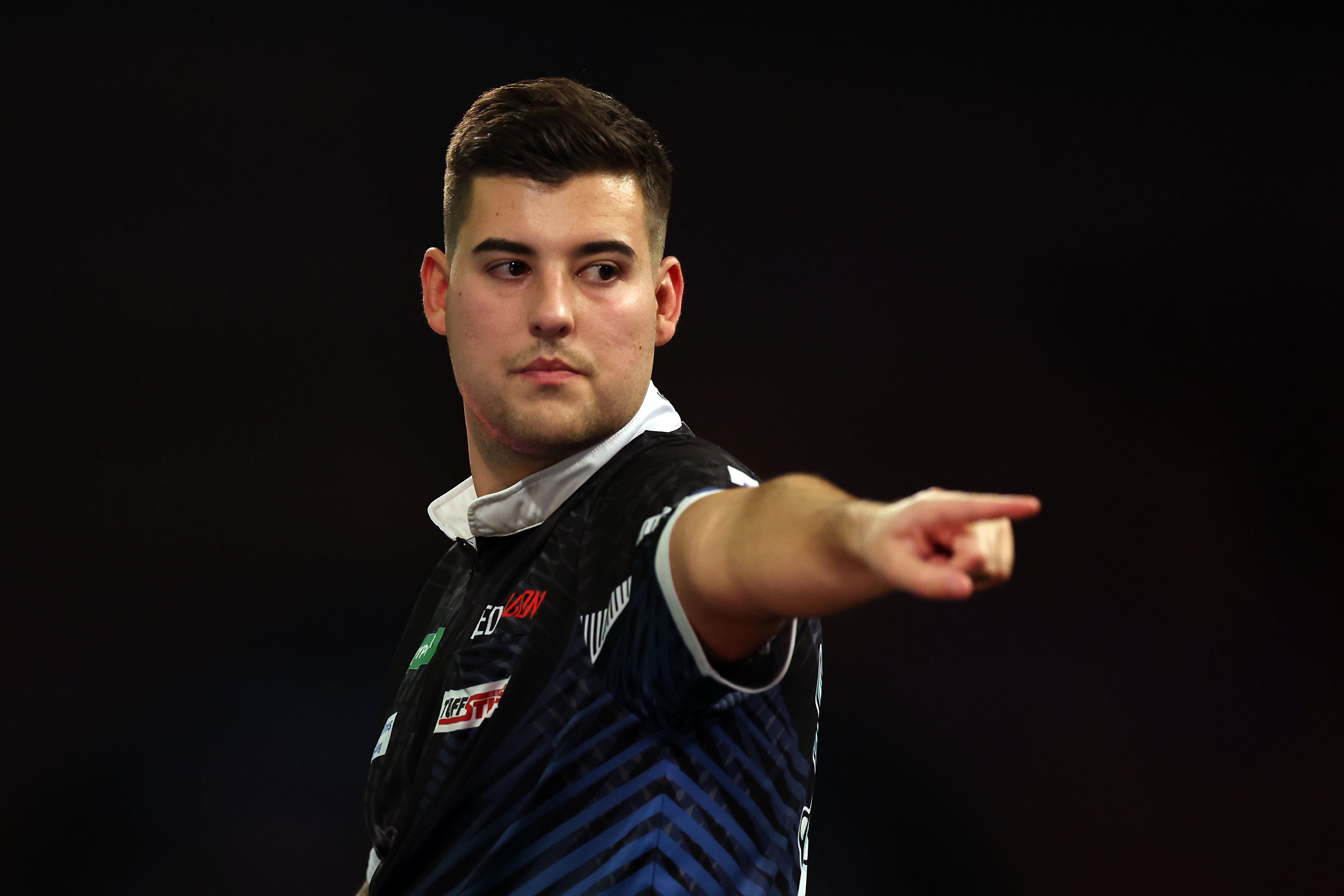 Ryan Meikle reacts during his first round win over Fallon Sherrock on day three of the Paddy Power World Darts Championship at Alexandra Palace (Steven Paston/PA)