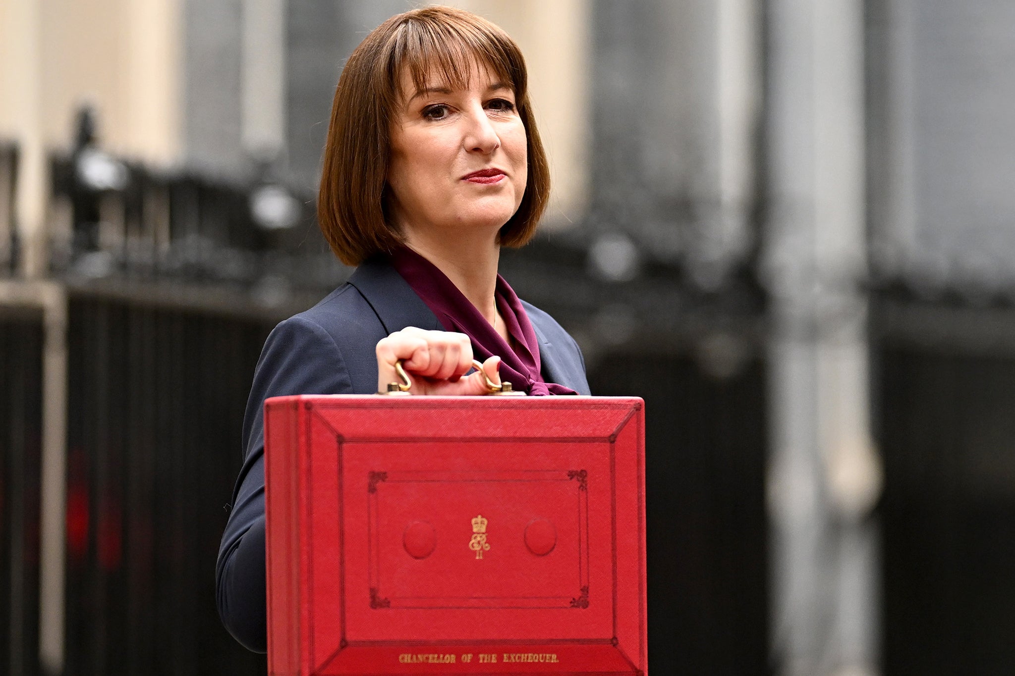 Chancellor of the Exchequer, Rachel Reeves, poses with the red Budget Box