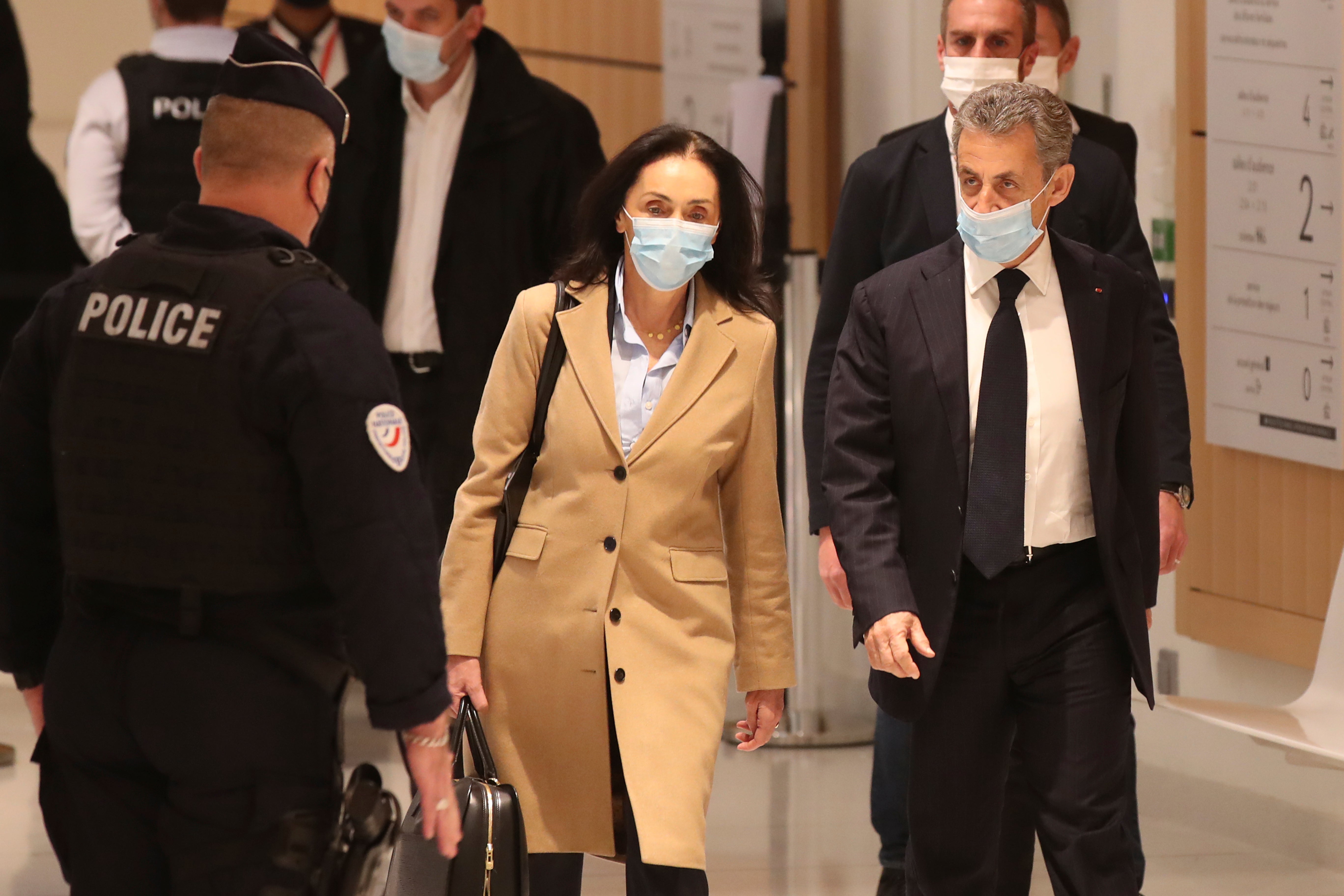 Sarkozy and his lawyer arrive in a Paris courtroom for a 2020 court case