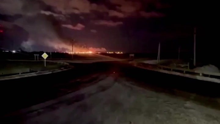 A fire burns at a Russian oil refinery after a Ukrainian drone strike late last year