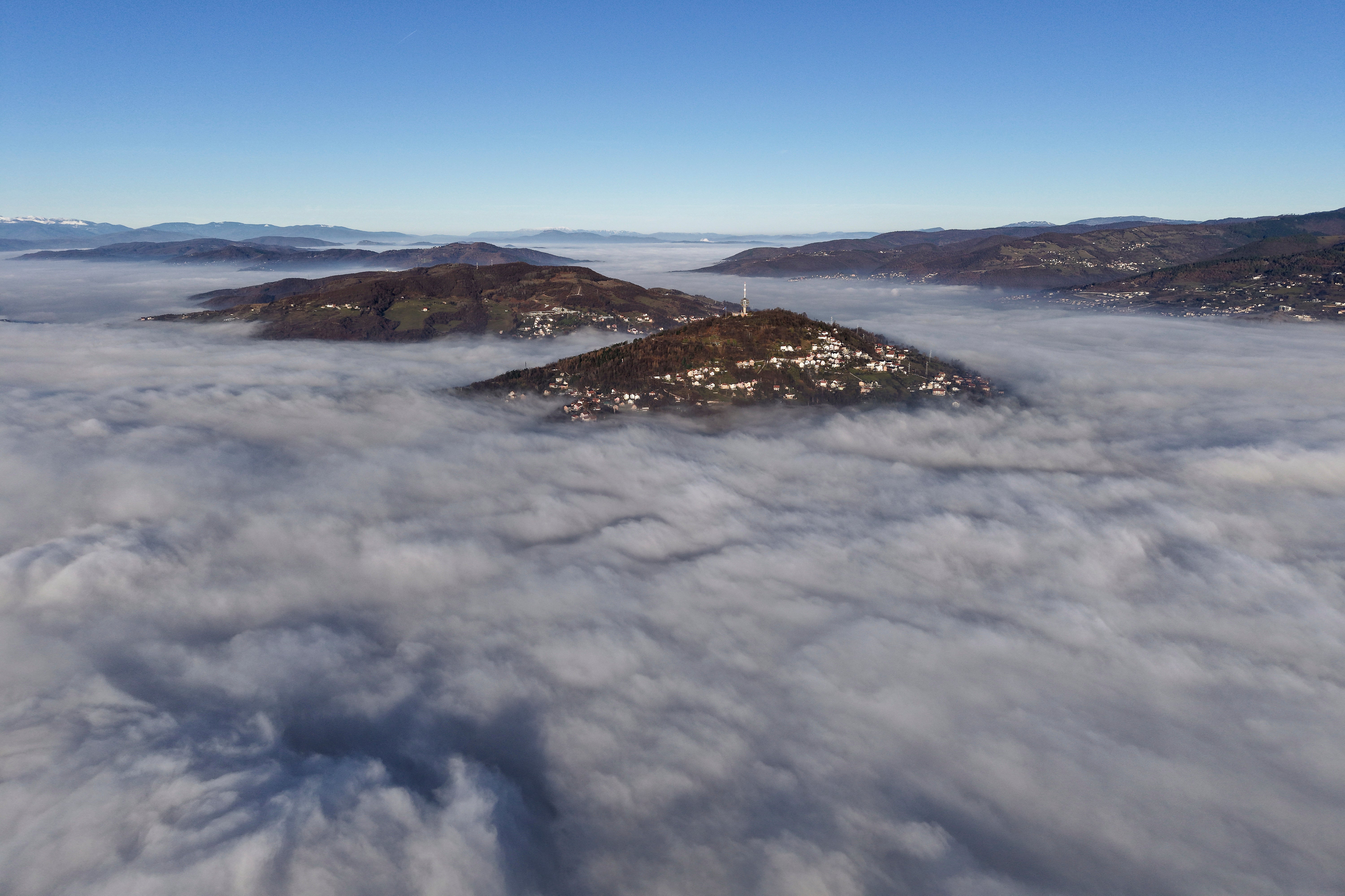 General view of Sarajevo and TV Tower as a dense layer of fog and smog blankets Sarajevo, Bosnia