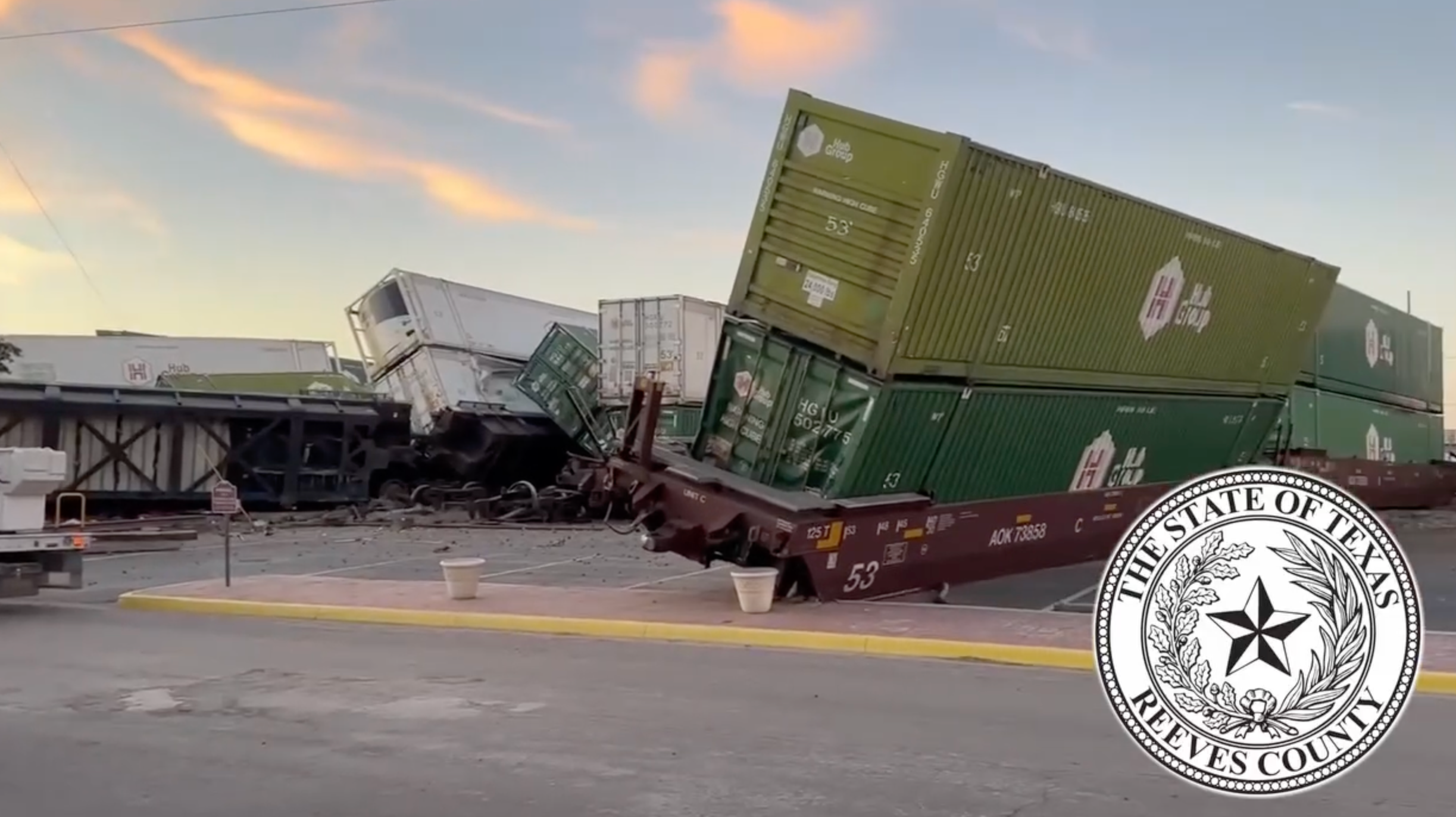 Carriages have been left strewn by the roadside after the train derailed