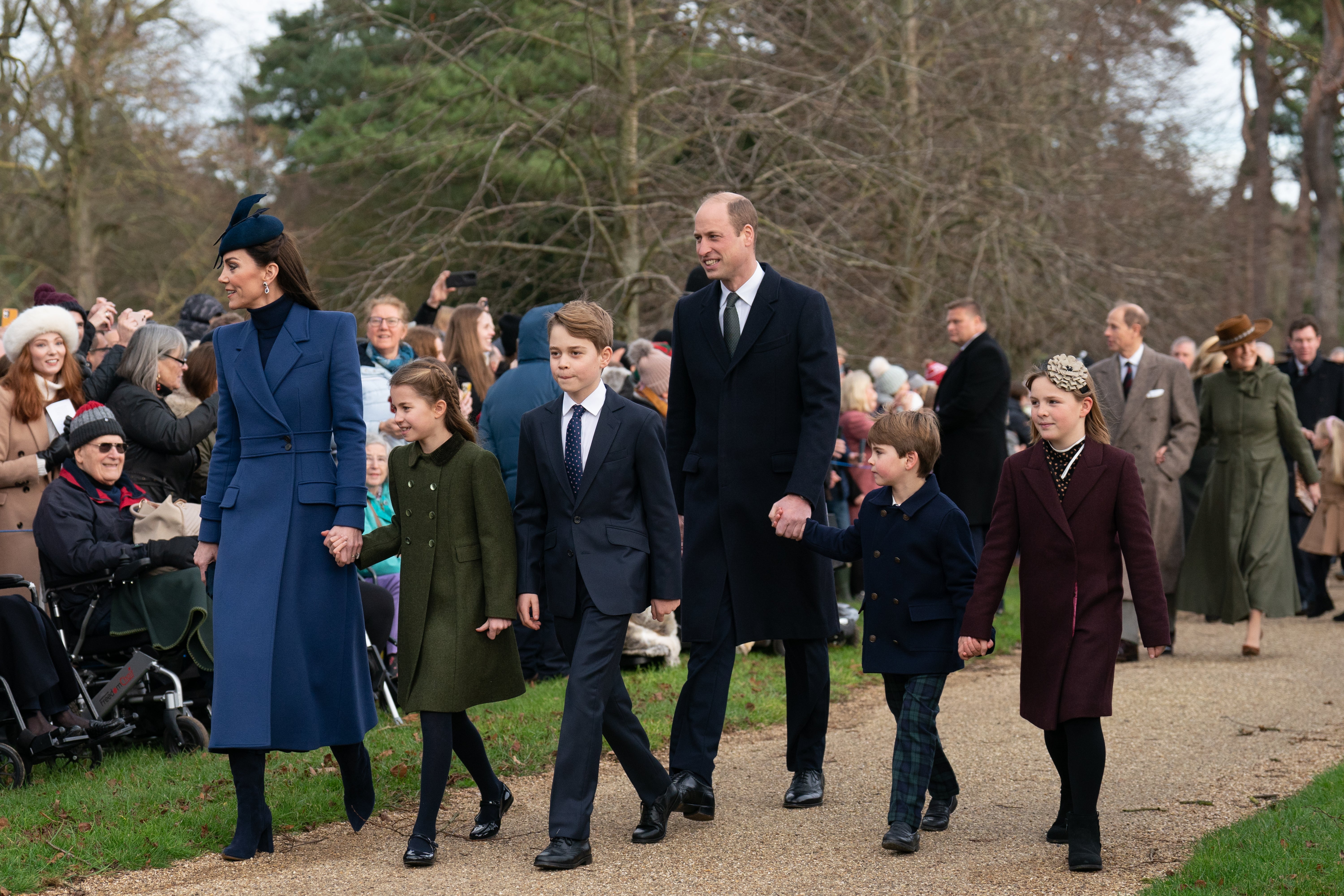 Kate and William at Sandringham last Christmas with their children, from left, Princess Charlotte, Prince George and Prince Louis, with Mia Tindall, the daughter of William’s cousin Zara (PA)