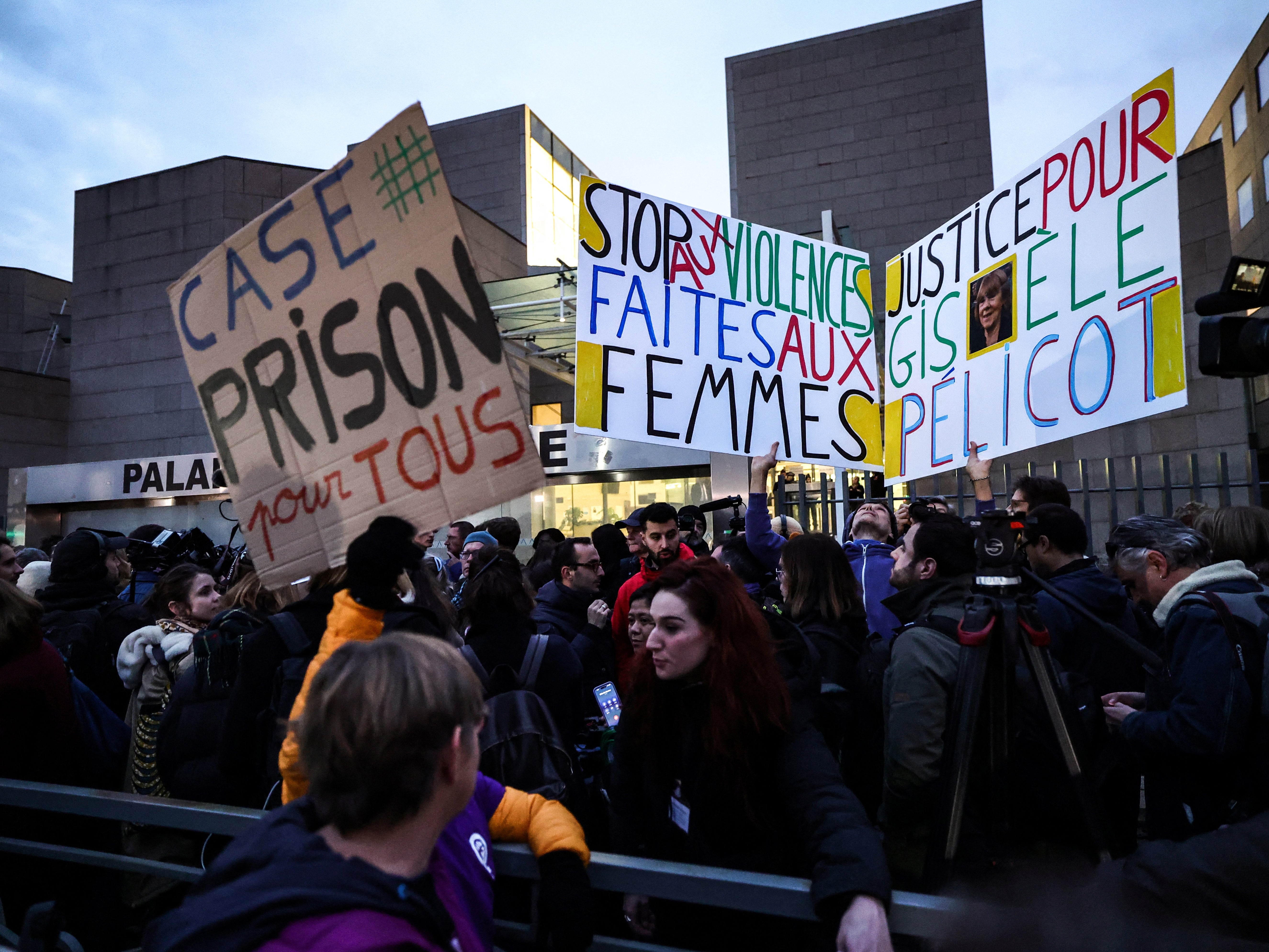 Activists at the courthouse in Avignon today