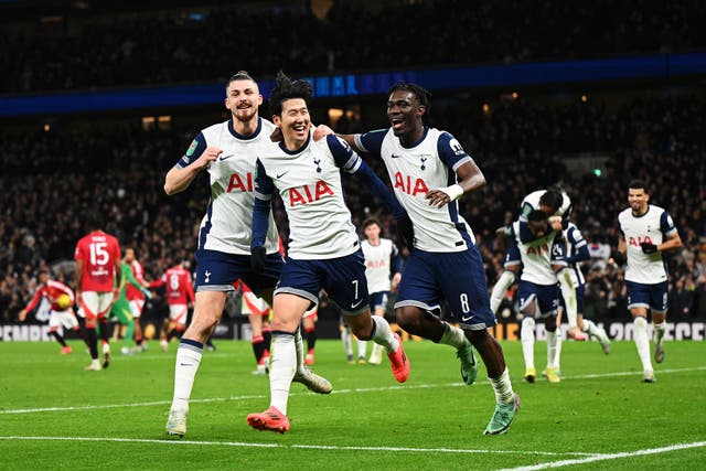 <p>Son Heung-Min of Tottenham Hotspur celebrates with teammates Radu Dragusin and Yves Bissouma after scoring his team’s fourth goal</p>