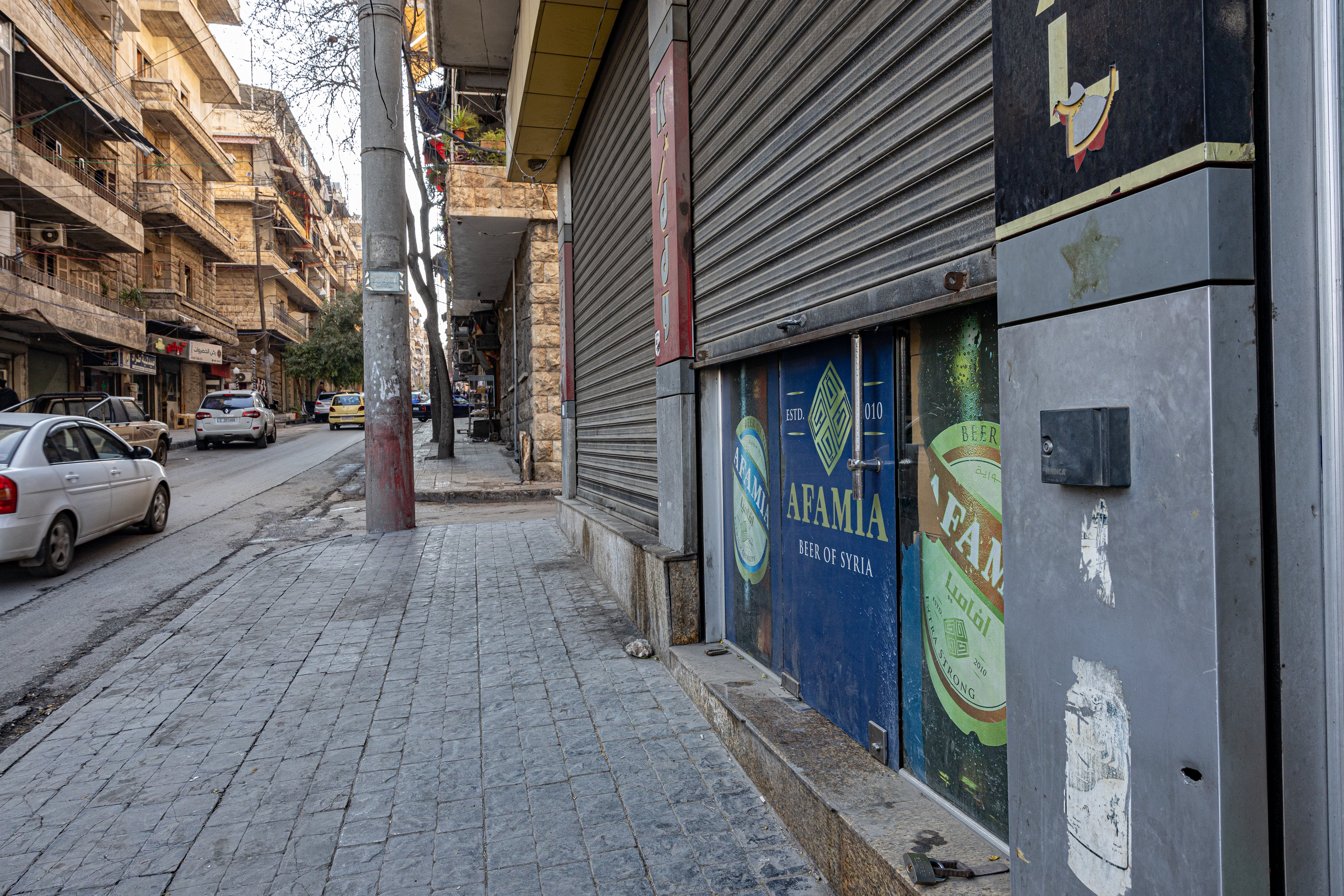 Most of the shops on ‘Alcohol Alley’ are shuttered, waiting for news of the new laws