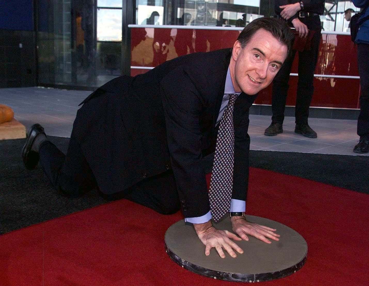 Hartlepool MP Peter Mandelson puts his hands in cement for the opening of the new 6 million pound Warner Cinema at the Marina Village in Hartlepool. 24/1/2001