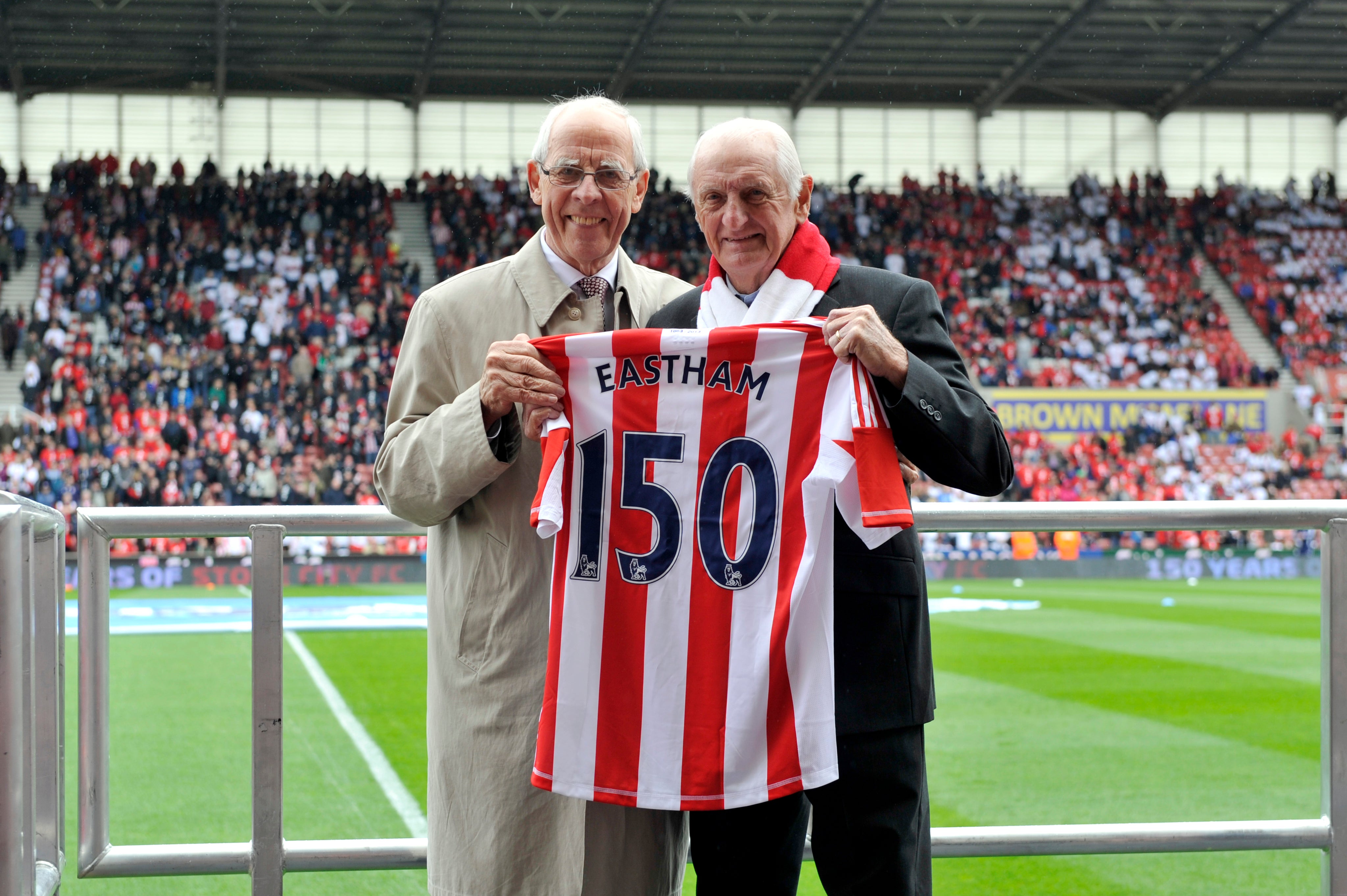 George Eastham (right) is awarded a Stoke shirt in honour of his career at the club (Clint Hughes/PA)