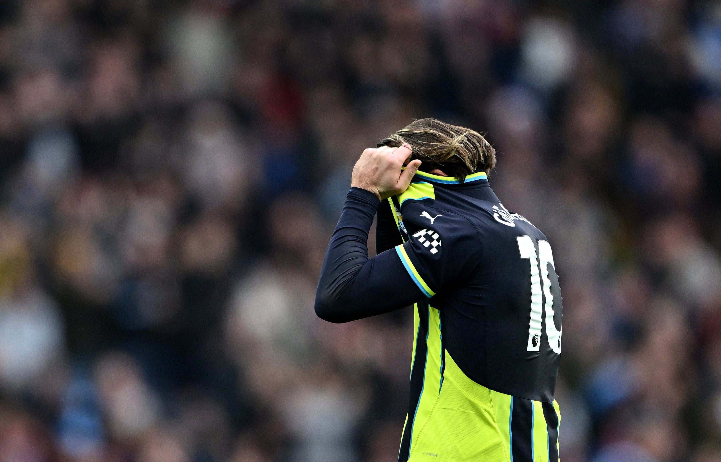 Jack Grealish of Manchester City shows dejection after defeat