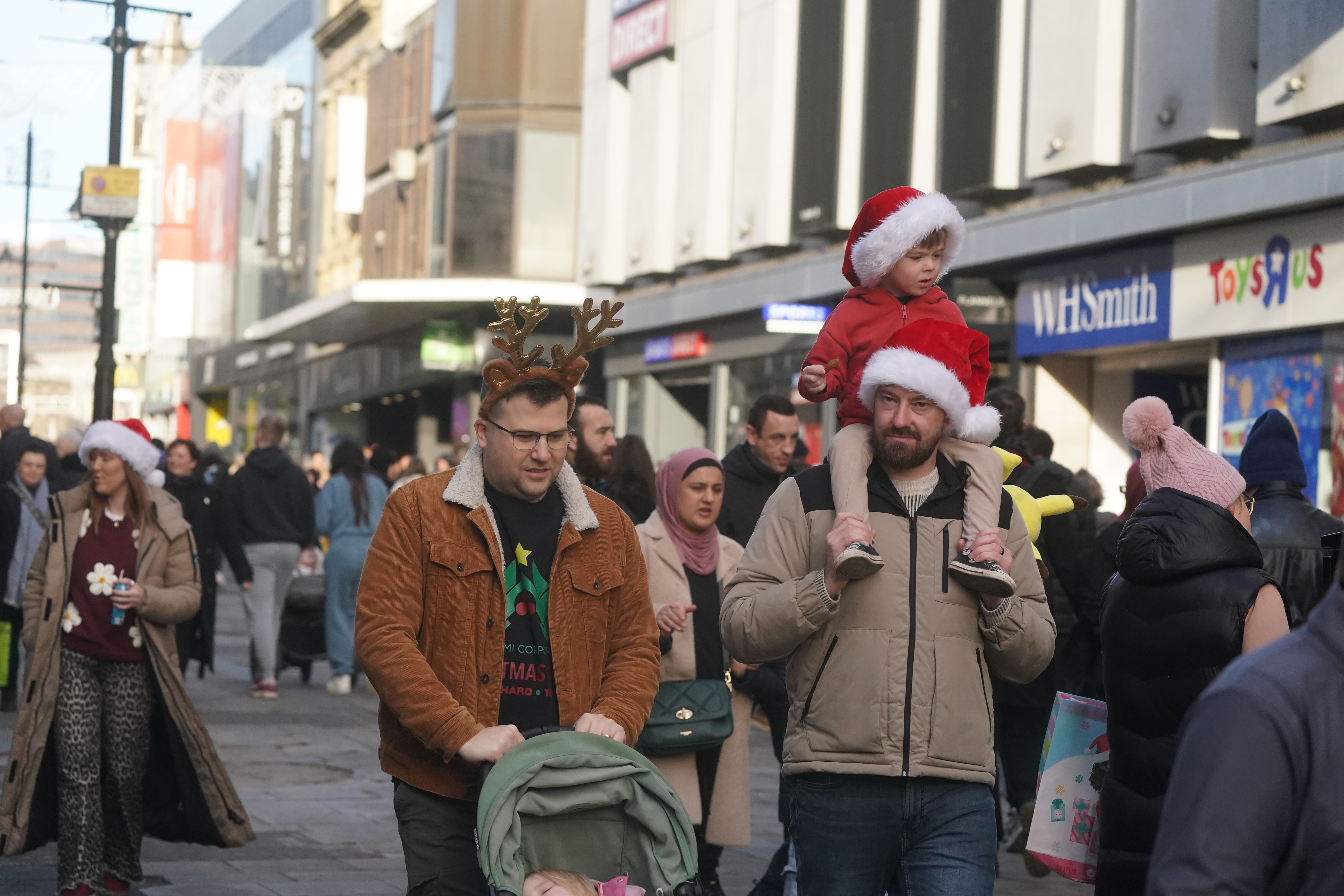 Shoppers in Newcastle before Christmas Day on Wednesday (Owen Humphreys/PA)