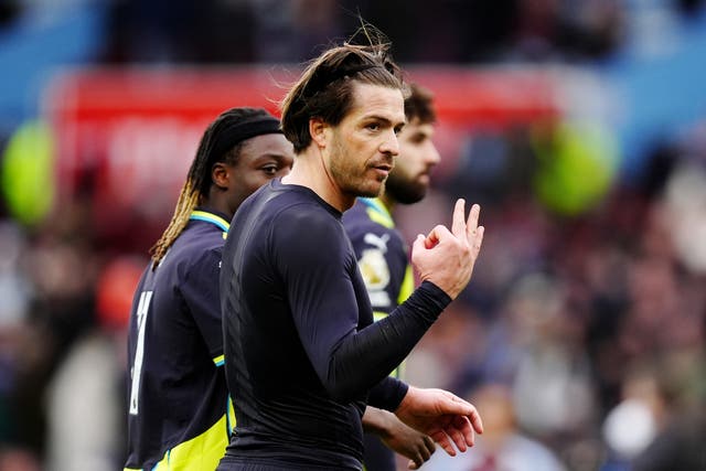 <p>Manchester City’s Jack Grealish gestures to the crowd after defeat to former club Aston Villa</p>