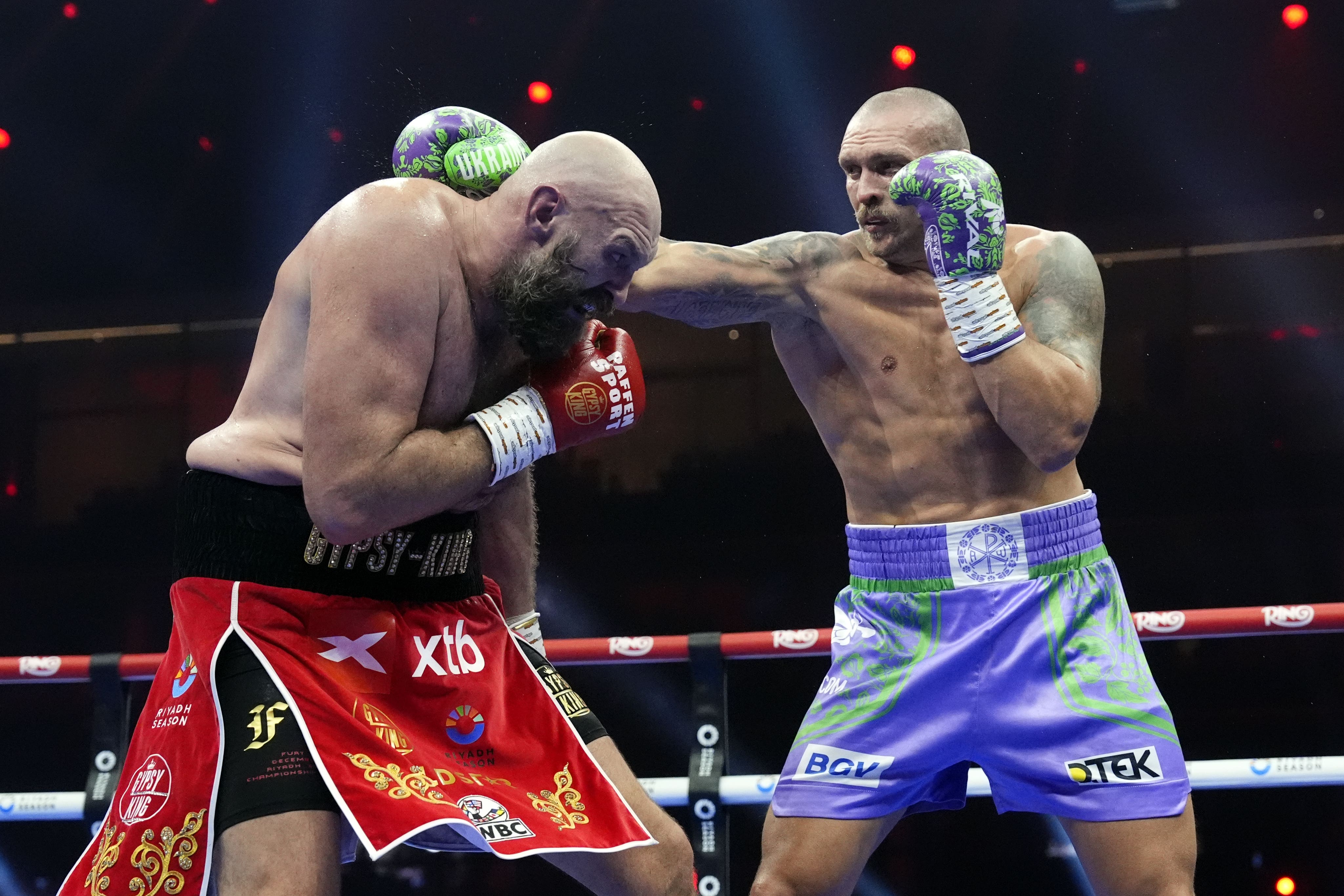 Tyson Fury (left) lost his heavyweight rematch with Oleksandr Usyk (Nick Potts/PA)