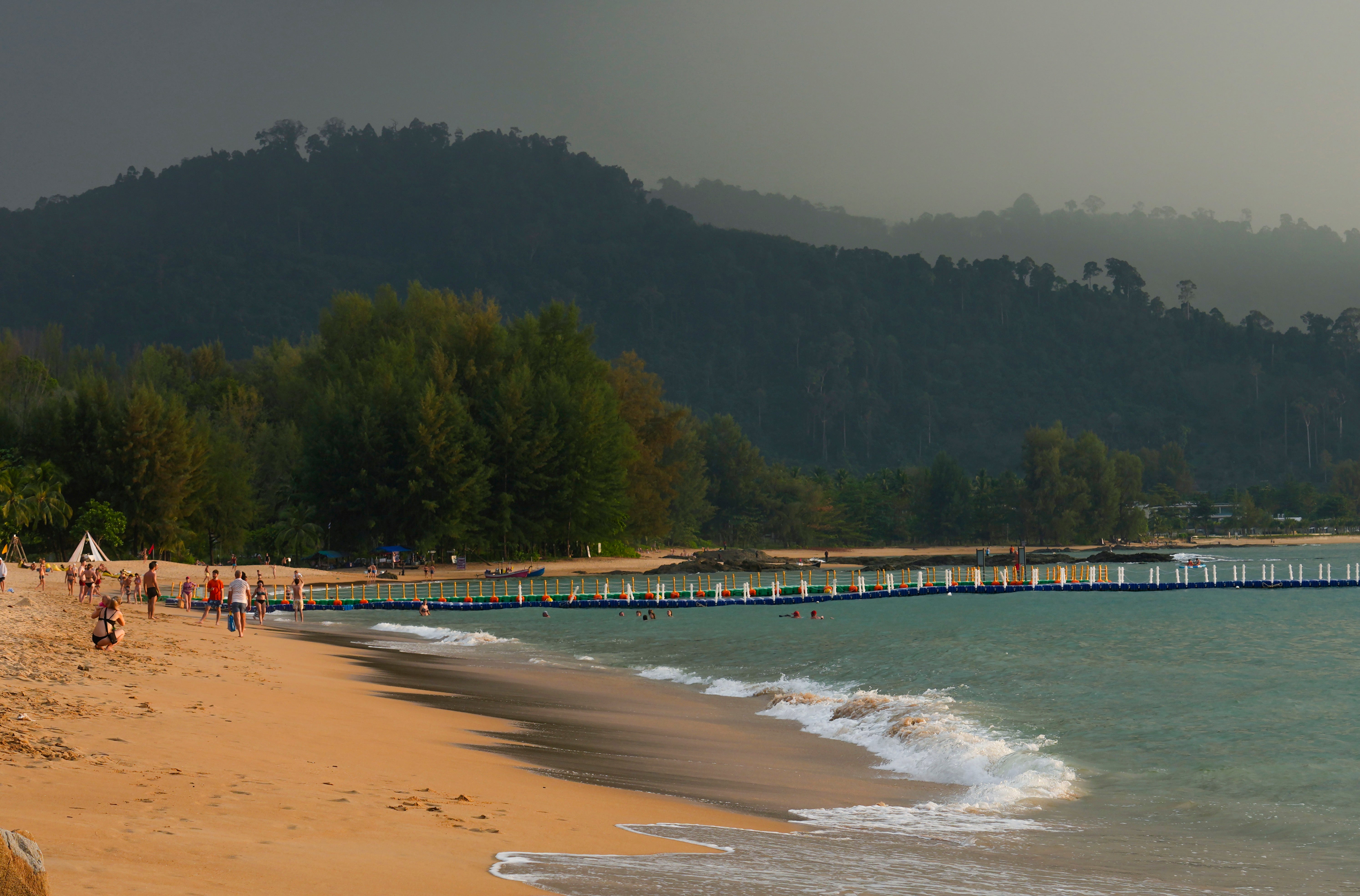 Tourists play on Bang Niang Beach, where tsunami hit 2004, Takuapa district of Phang Nga province