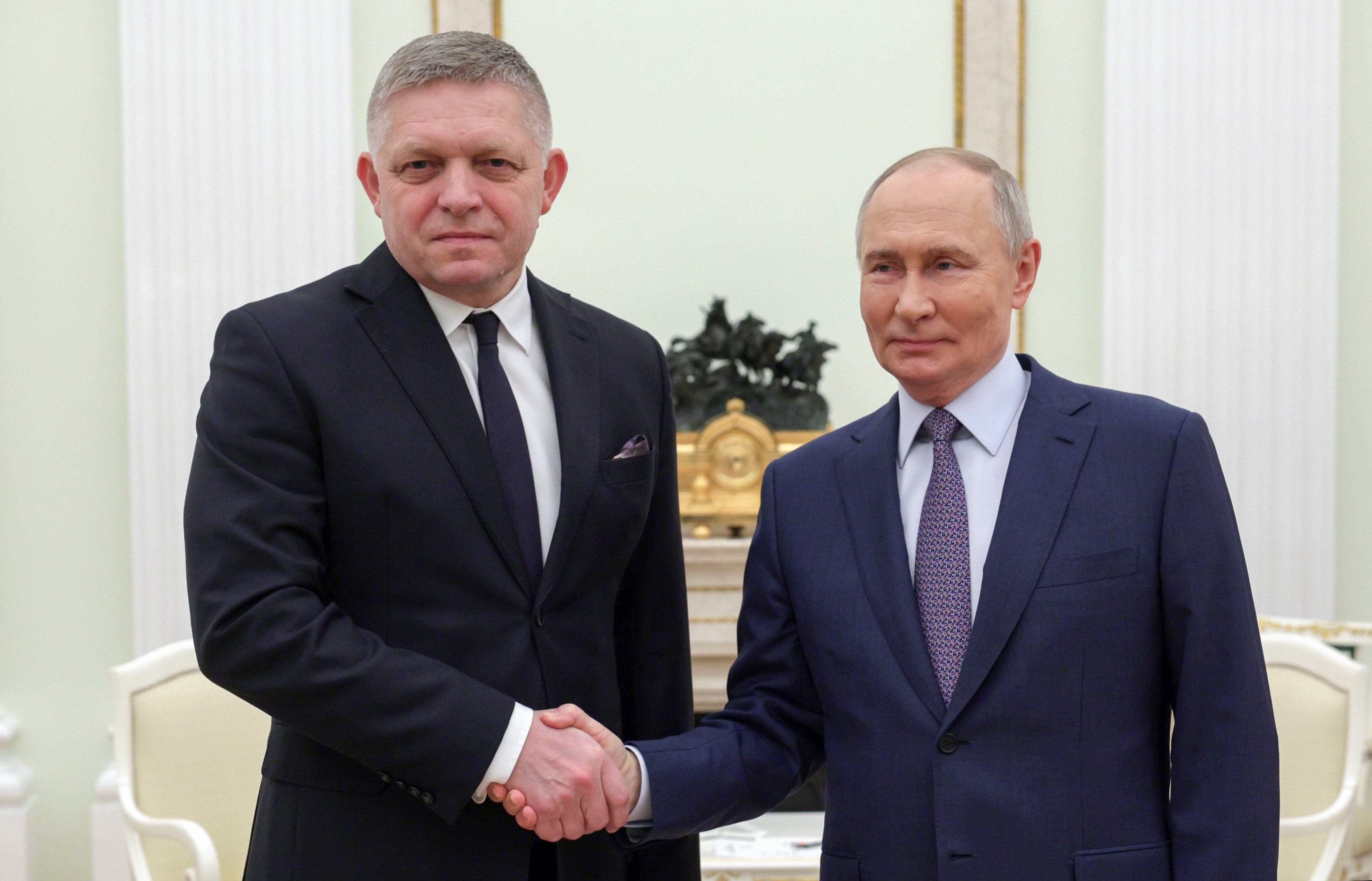 Russian president Vladimir Putin and Slovak prime minister Robert Fico shake hands during their meeting at the Kremlin in Moscow