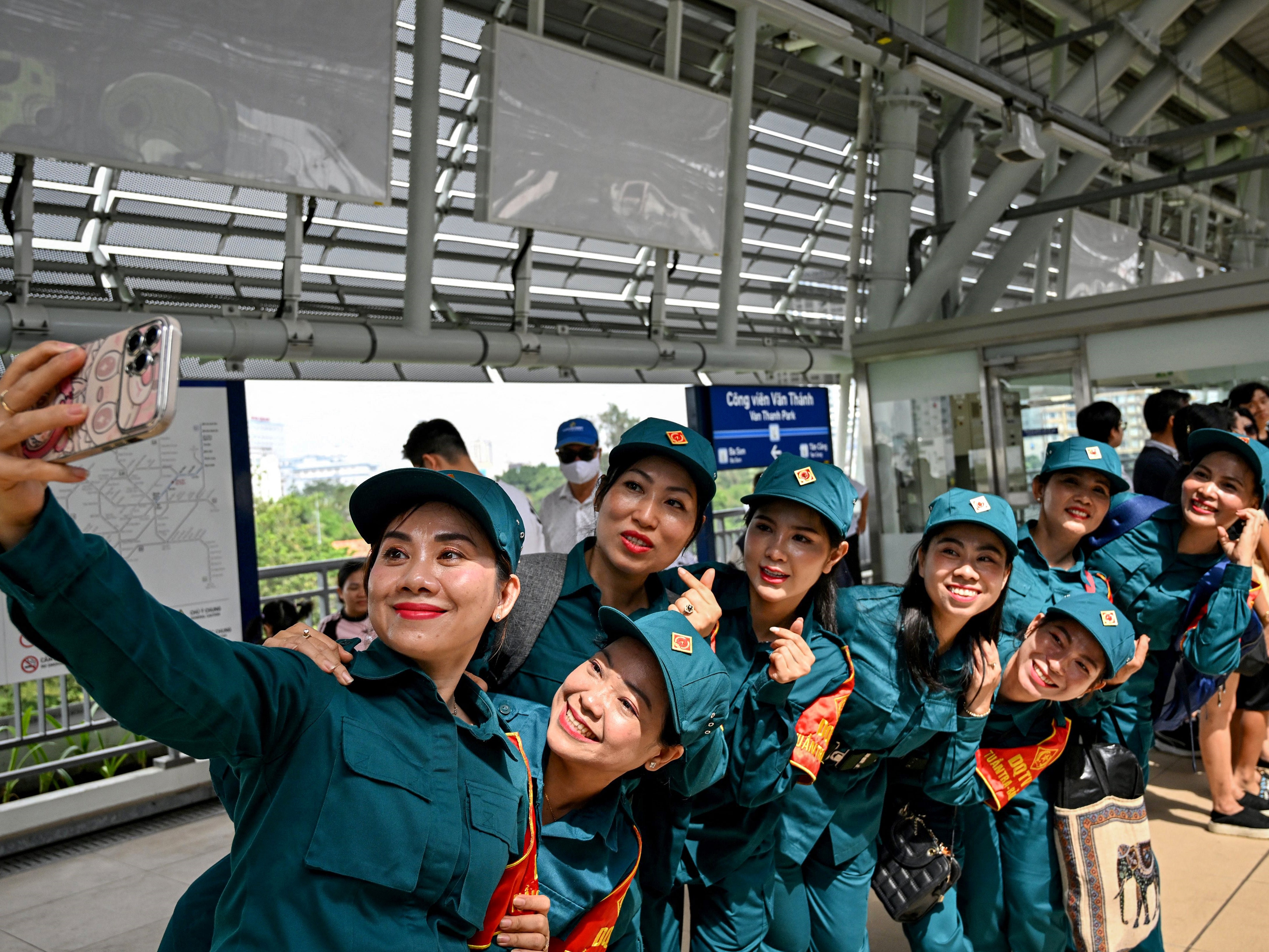 Soldiers take a selfie on the platform